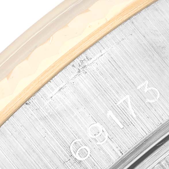 This close-up image features the model number engraving on the case of a Rolex Datejust 69173 Women's Steel and Gold (two tone) Black Dial 69173 Women's Steel and Gold (two tone) Black Dial watch.