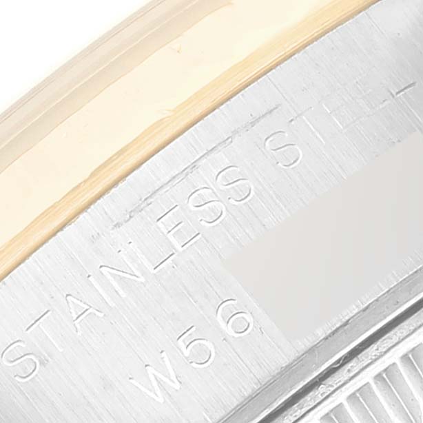 Close-up of a Rolex Datejust 69173 Women's Steel and Gold (two tone) White Dial 69173 Women's Steel and Gold (two tone) White Dial, showing the engraved "STAINLESS STEEL" text and part of the bezel.