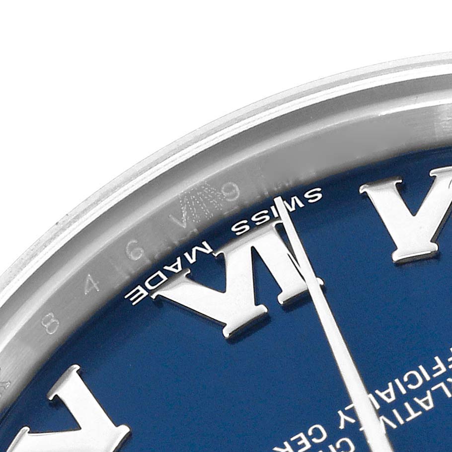 The image shows a close-up of the Rolex Mid-Size 178240 Women's Stainless Steel Blue Dial 178240 Women's Stainless Steel Blue Dial watch dial highlighting the Roman numerals and "Swiss Made" text.