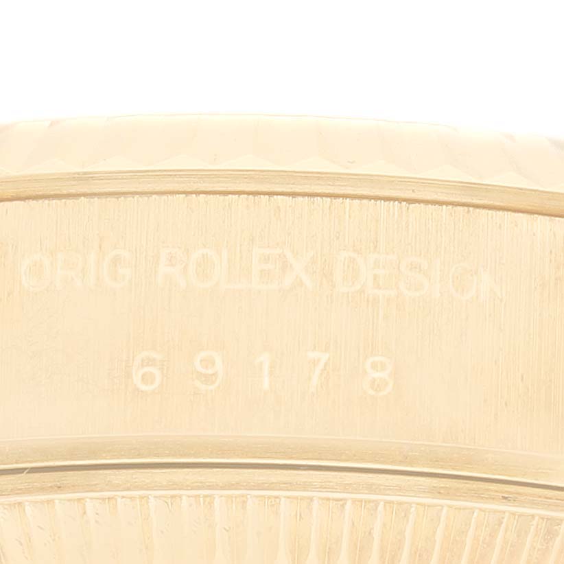 This image shows a close-up of the model number engraving on the Rolex President 69178G Women's Yellow Gold Champagne Dial 69178G Women's Yellow Gold Champagne Dial watch's case.