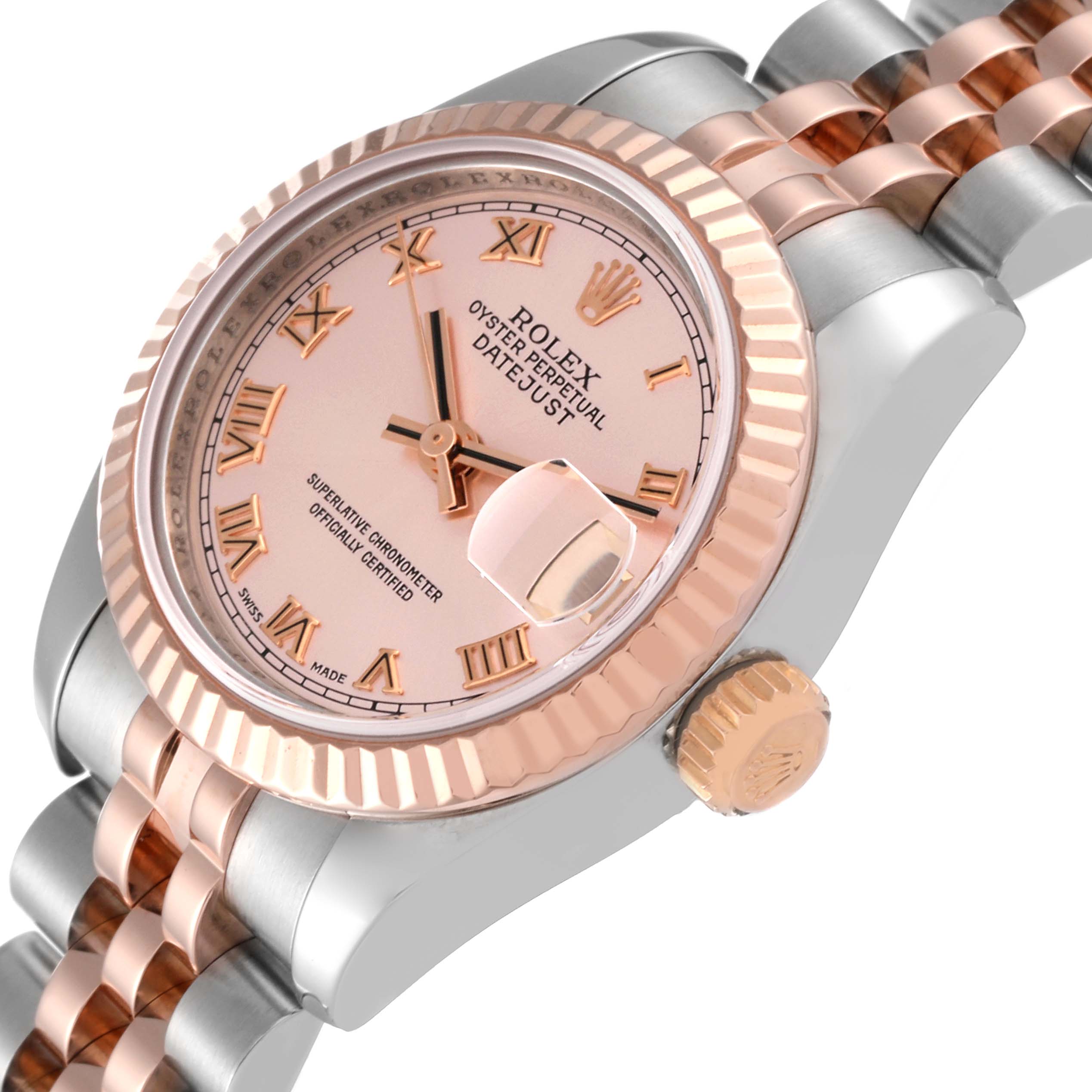 The image shows a close-up angle of the Rolex Datejust 179171 Women's Steel and Gold (two tone) Pink Dial 179171 Women's Steel and Gold (two tone) Pink Dial watch, highlighting the dial, bezel, and part of the bracelet.