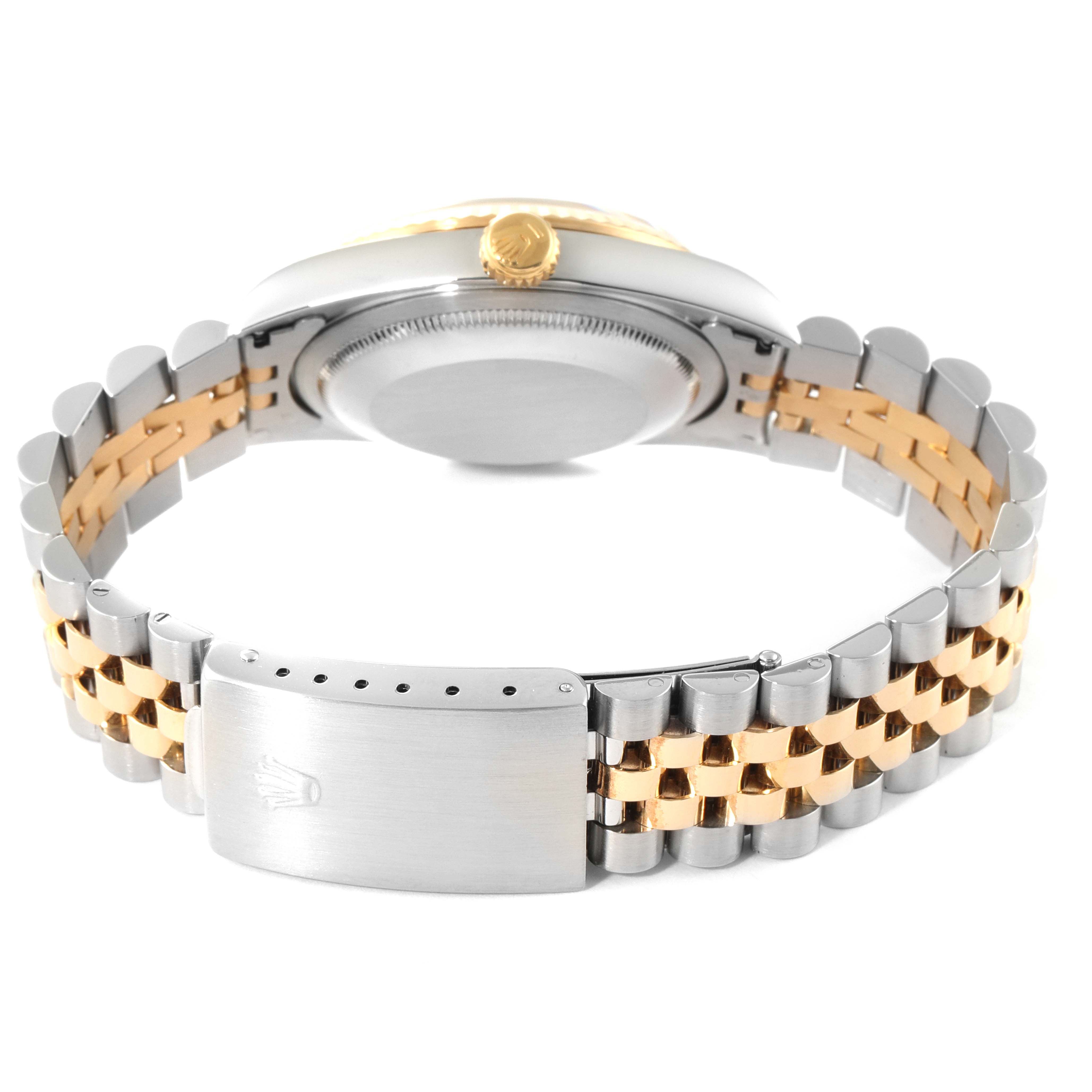 The image shows the back of a Rolex Datejust 16233 Men's Steel and Gold (two tone) Champagne Dial 16233 Men's Steel and Gold (two tone) Champagne Dial watch, highlighting its two-tone metal bracelet and clasp.