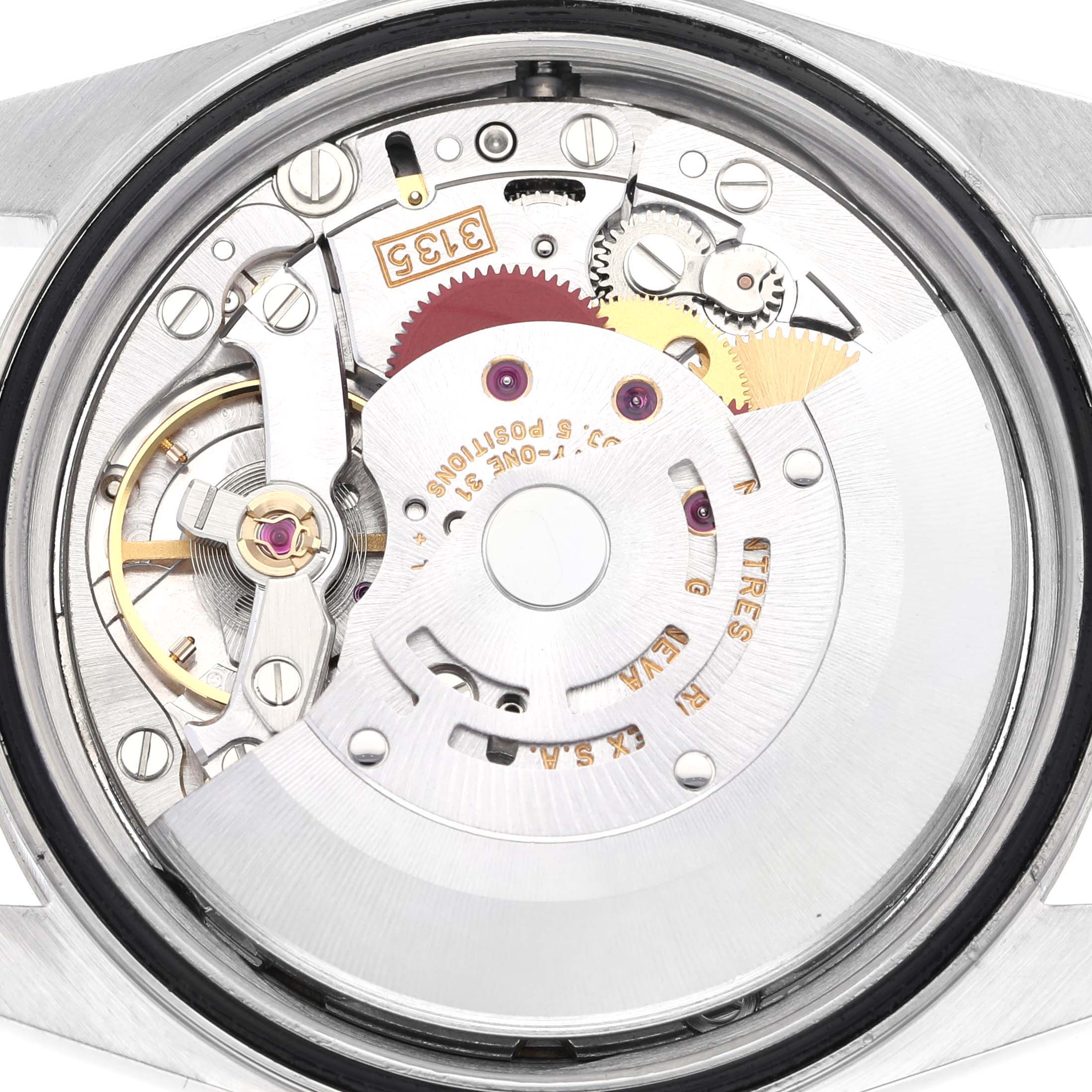 This image shows the internal mechanism of a Rolex Datejust 16234 Men's Stainless Steel Black Dial 16234 Men's Stainless Steel Black Dial watch, highlighting gears, jewels, and the intricate movement parts.