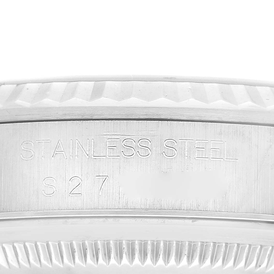 This close-up image shows the side engraving and bezel of a Rolex Datejust 16234 Men's Stainless Steel Black Dial 16234 Men's Stainless Steel Black Dial watch, highlighting its stainless steel construction.