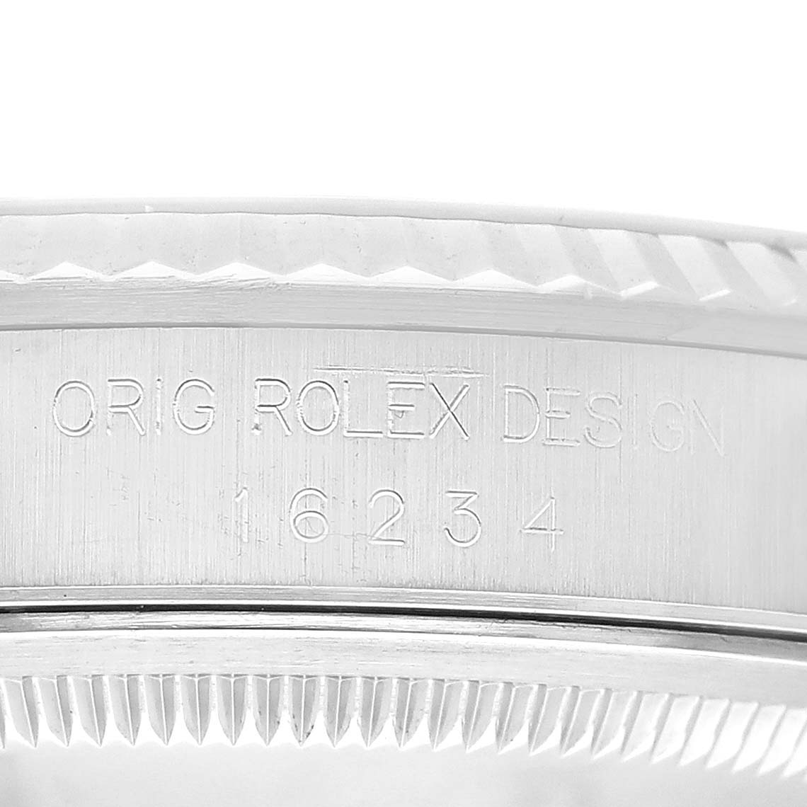 This image shows a close-up of the side of the bezel and the engraved reference number "16234" of a Rolex Datejust 16234 Men's Stainless Steel Black Dial 16234 Men's Stainless Steel Black Dial watch.
