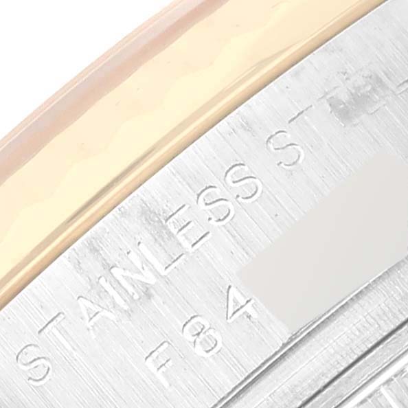 The image shows a close-up of the side of a Rolex Datejust 179173G Women's Steel and Gold (two tone) Silver Dial 179173G Women's Steel and Gold (two tone) Silver Dial watch, focusing on the "Stainless Steel" engraving.