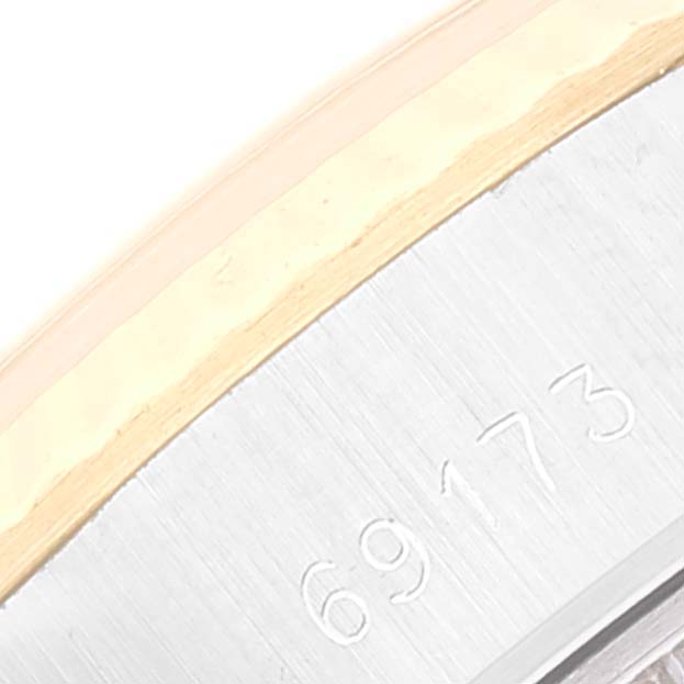 The image shows a close-up of the model number "69173" engraved on the side of a Rolex Datejust 69173 Women's Steel and Gold (two tone) Champagne Dial 69173 Women's Steel and Gold (two tone) Champagne Dial watch bezel.