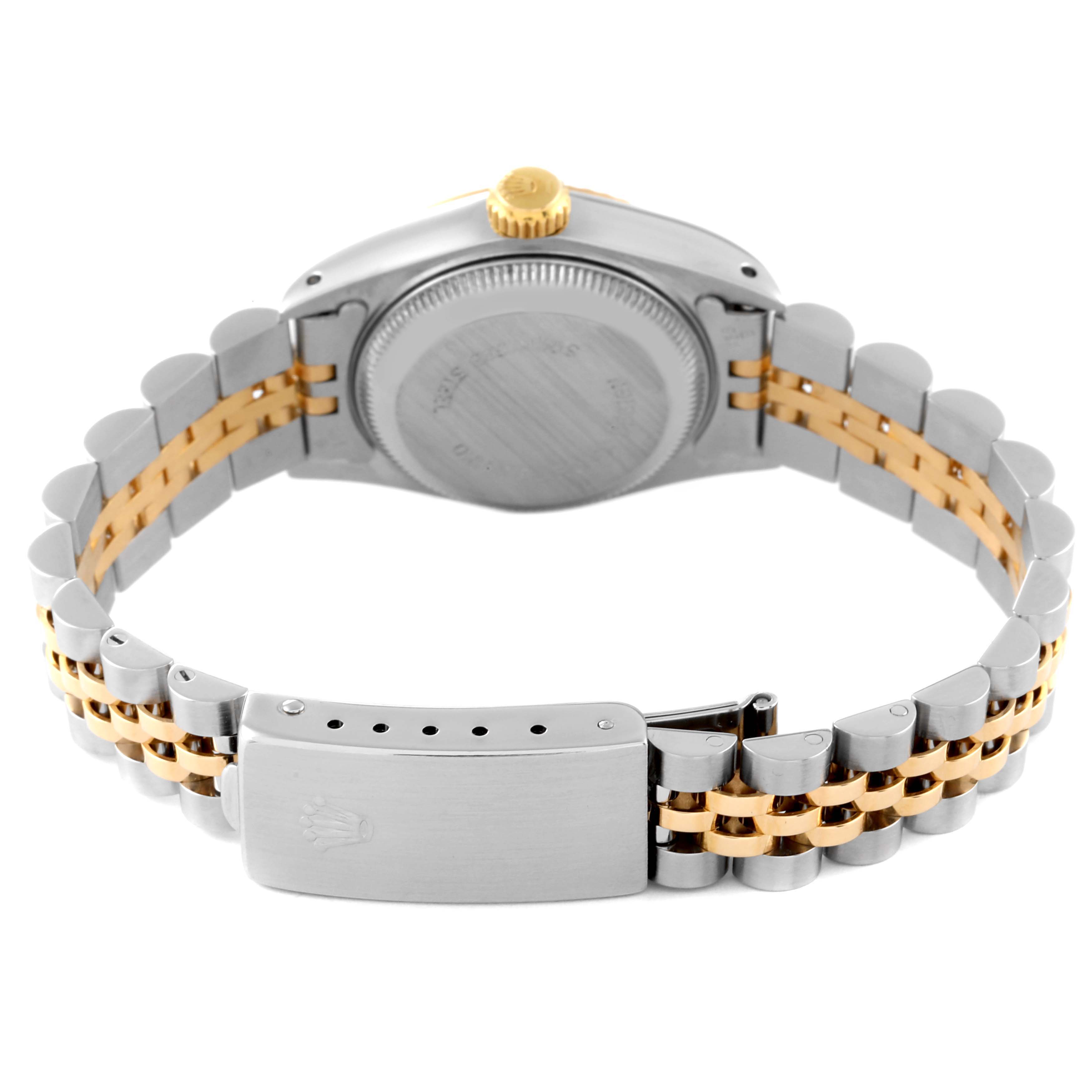The image shows the back case and bracelet of a Rolex Datejust 69173 Women's Steel and Gold (two tone) Champagne Dial 69173 Women's Steel and Gold (two tone) Champagne Dial watch, highlighting the two-tone metal bracelet and clasp.