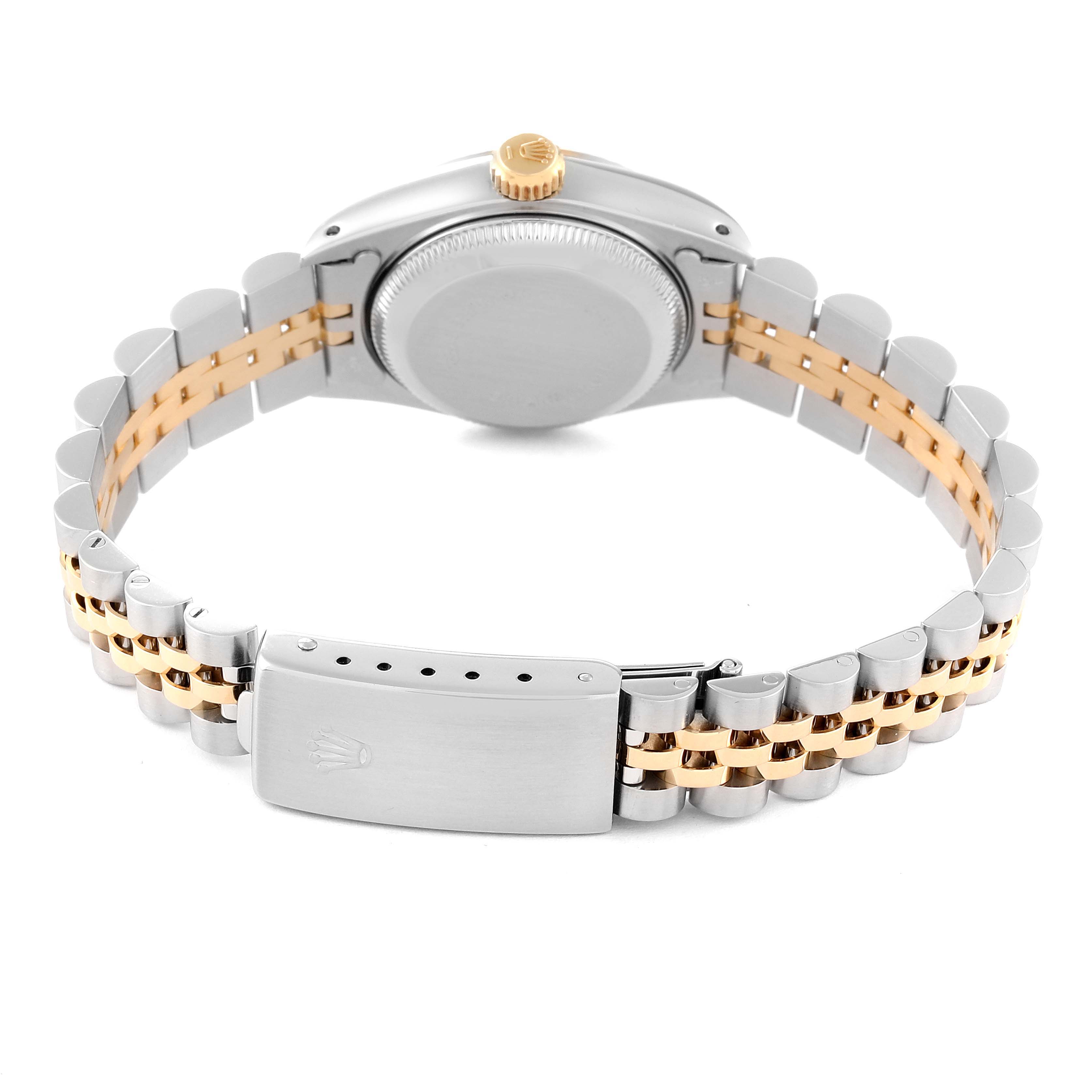 The image shows the back view of a Rolex Datejust 69173 Women's Steel and Gold (two tone) Champagne Dial 69173 Women's Steel and Gold (two tone) Champagne Dial watch, highlighting the case, crown, and two-tone bracelet with clasp.