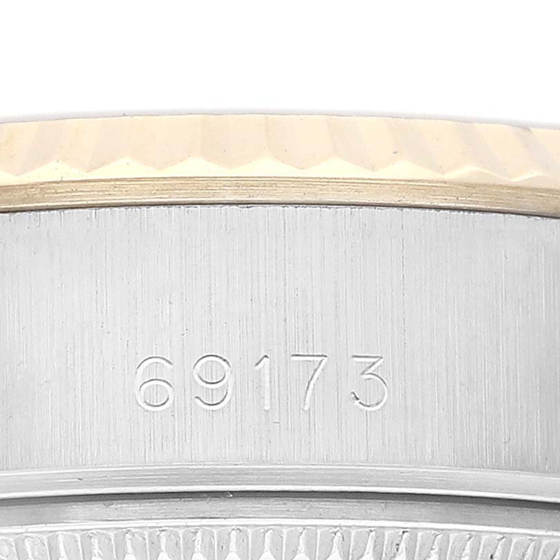 This image shows a close-up of the case side and bezel of the Rolex Datejust 69173G Women's Steel and Gold (two tone) Champagne Dial 69173G Women's Steel and Gold (two tone) Champagne Dial model, highlighting the model number "69173."