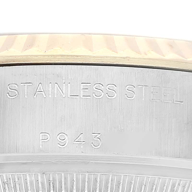 This is a close-up image showing the side engraving of the Rolex Datejust 79173G Women's Steel and Gold (two tone) Champagne Dial 79173G Women's Steel and Gold (two tone) Champagne Dial model, highlighting the "STAINLESS STEEL" marking.