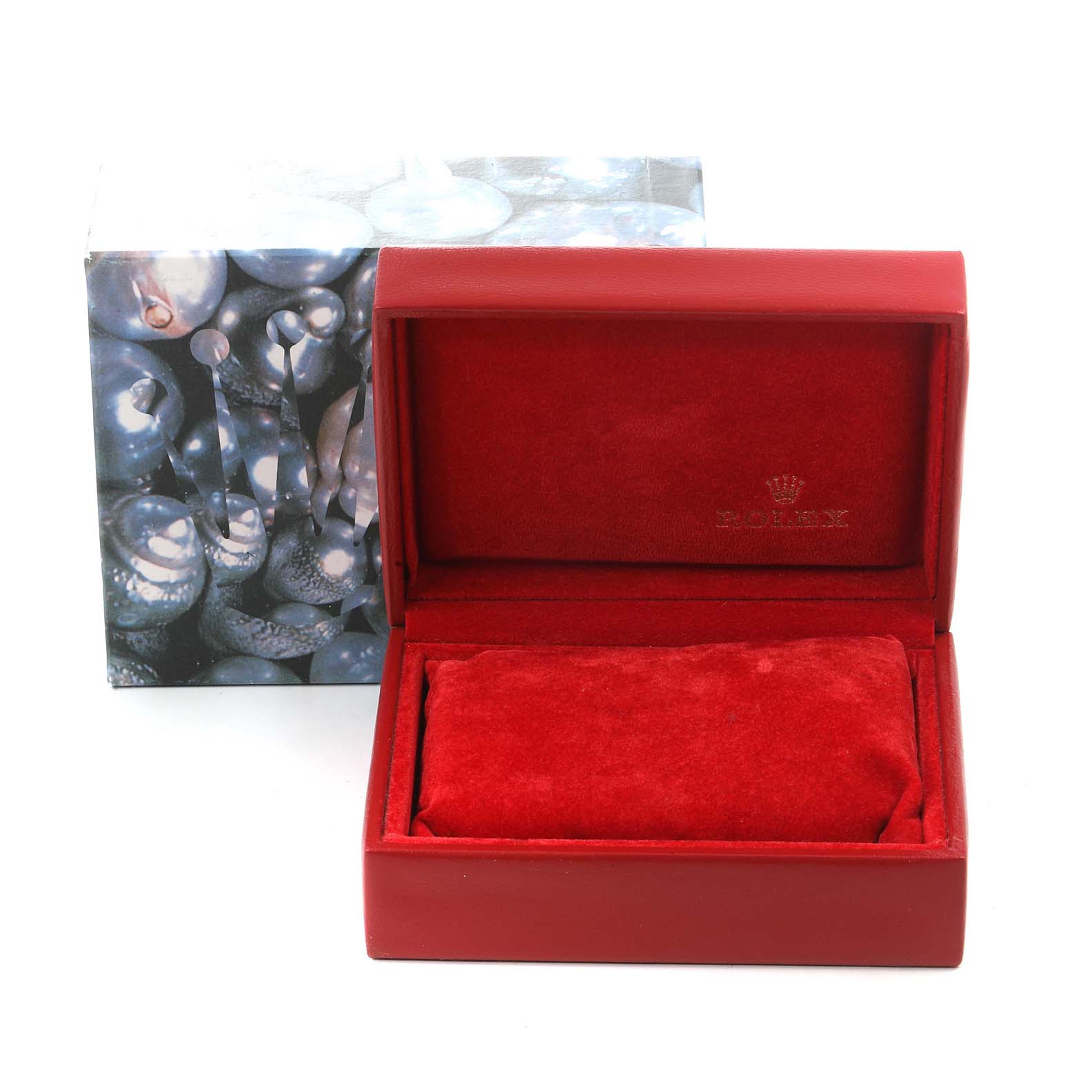 The image shows a red Rolex Datejust 79173 Women's Steel and Gold (two tone) Champagne Dial 79173 Women's Steel and Gold (two tone) Champagne Dial watch box with a matching interior cushion and a decorative outer box.