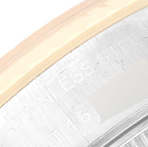 The image shows a close-up view of the bezel and part of the case back of a Rolex Datejust 69173 Women's Steel and Gold (two tone) White Dial 69173 Women's Steel and Gold (two tone) White Dial watch, highlighting the stainless steel.