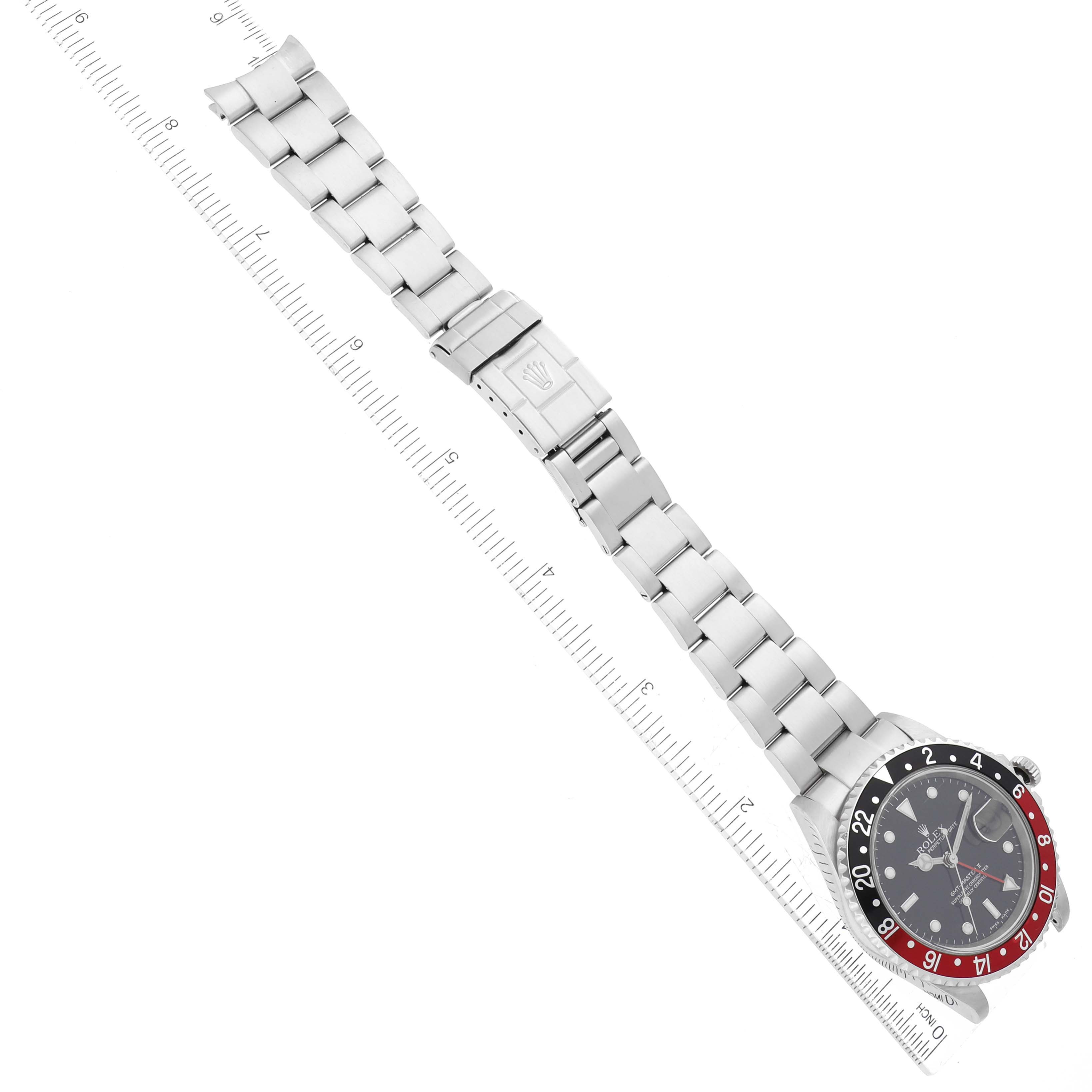 The image shows the full length of a Rolex GMT-Master 16710 Men's Stainless Steel Black Dial 16710 Men's Stainless Steel Black Dial watch, including the face, bezel, bracelet, and clasp, viewed from above.