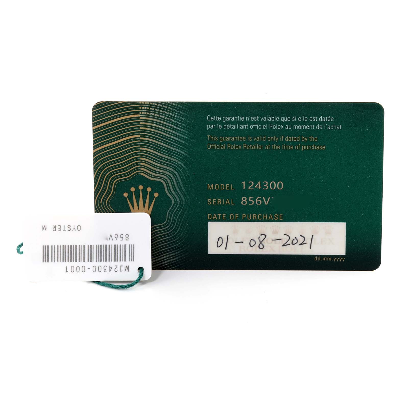 The image shows the warranty card and tag for a Rolex Oyster Perpetual 124300 Men's Stainless Steel Silver Dial 124300 Men's Stainless Steel Silver Dial model 124300.