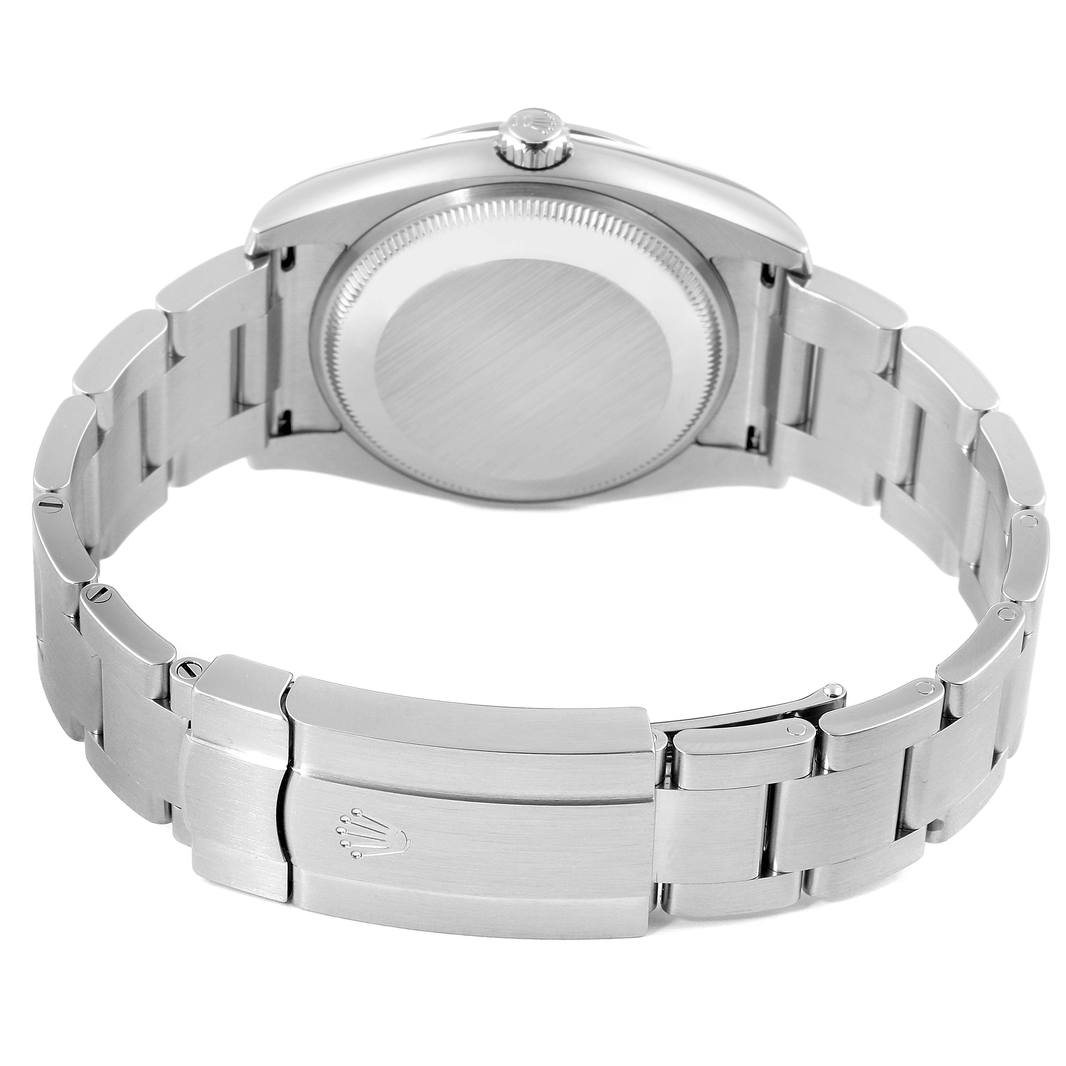 The image shows the back view of a Rolex Oyster Perpetual 114200 Men's Stainless Steel Black Dial 114200 Men's Stainless Steel Black Dial watch, highlighting its case back and bracelet.