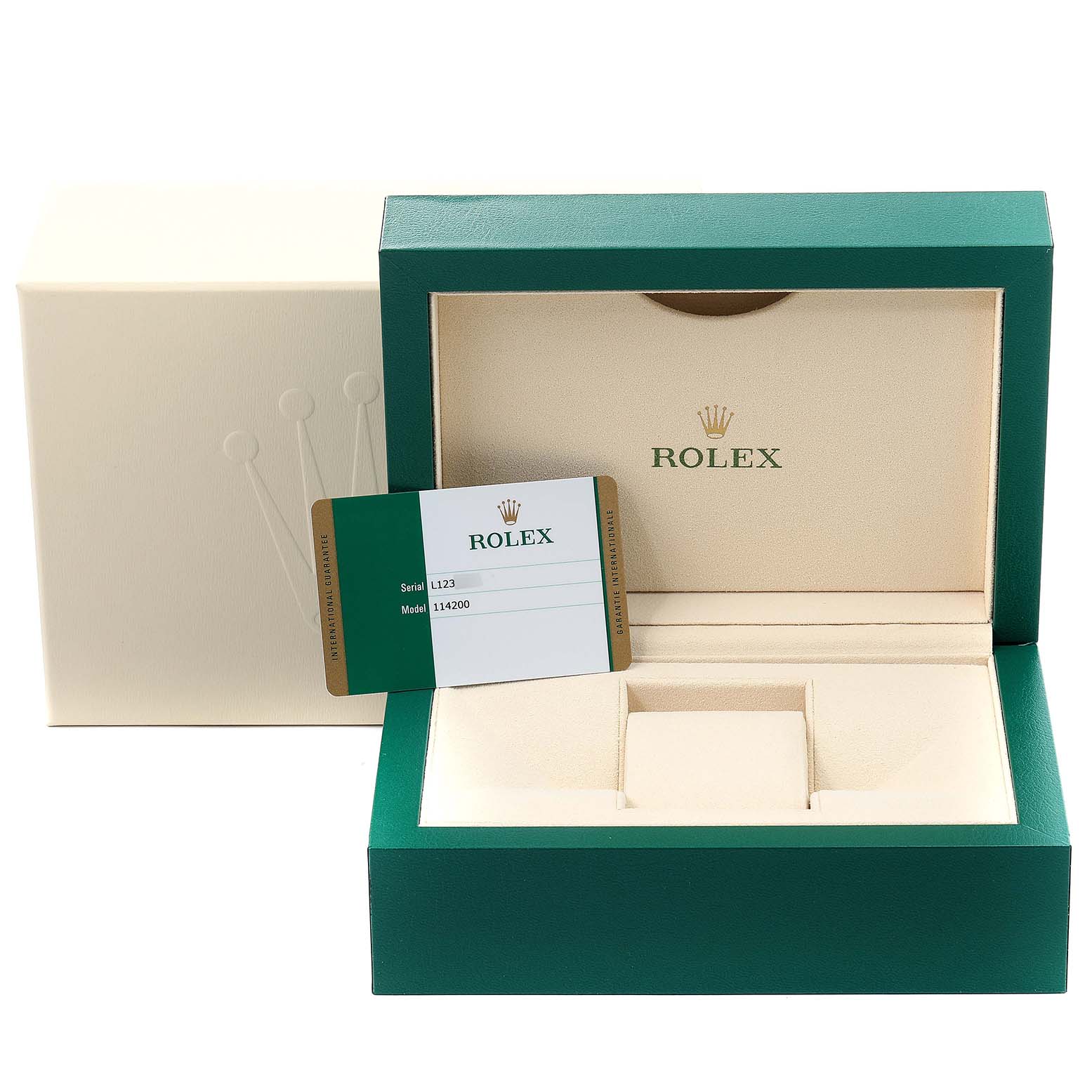 The image shows the open box for the Rolex Oyster Perpetual 114200 Men's Stainless Steel Black Dial 114200 Men's Stainless Steel Black Dial model, displaying the interior and a warranty card.