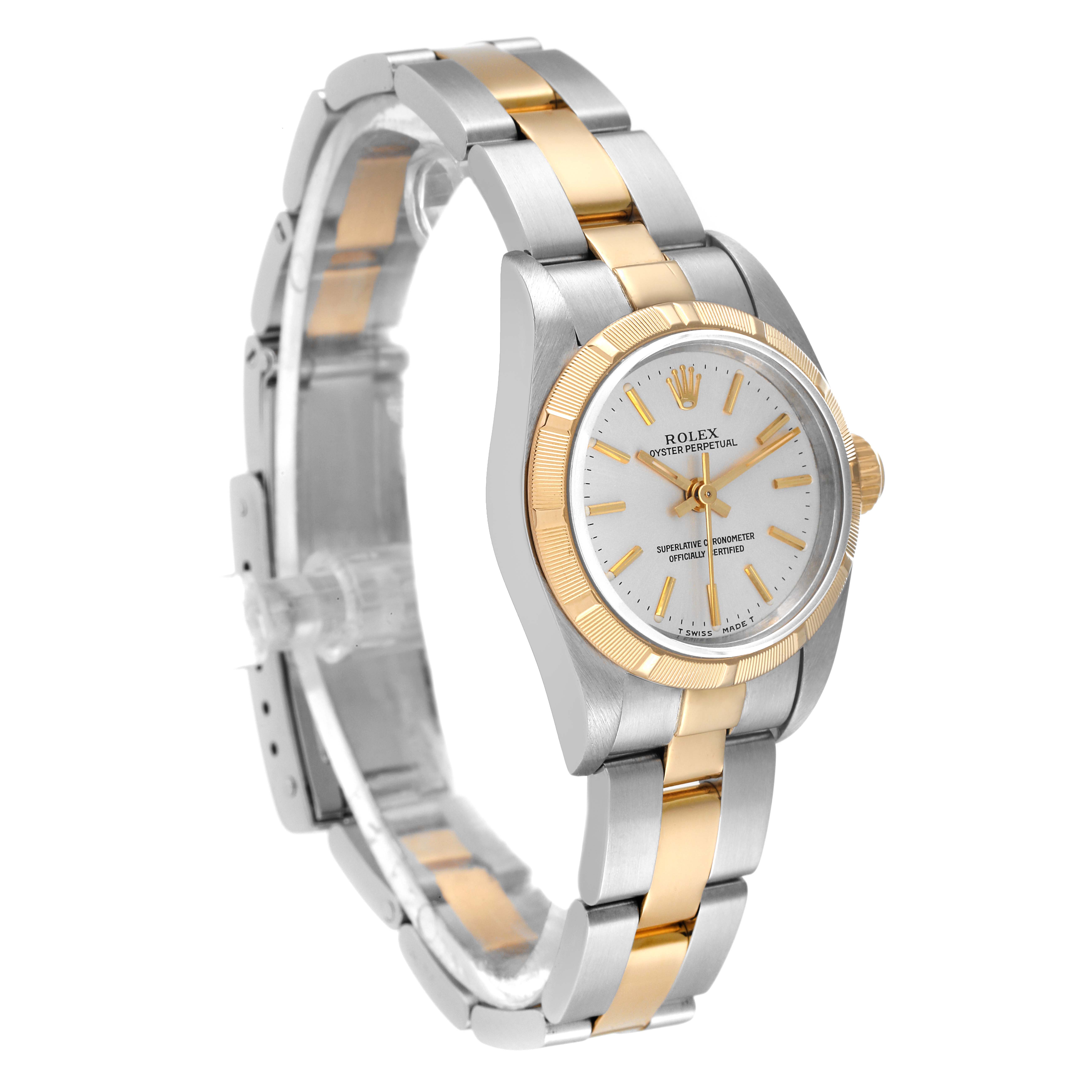 The image shows a Rolex Oyster Perpetual 67233 Women's Steel and Gold (two tone) Silver Dial 67233 Women's Steel and Gold (two tone) Silver Dial watch at a three-quarter angle, highlighting the dial, bezel, and two-tone bracelet.