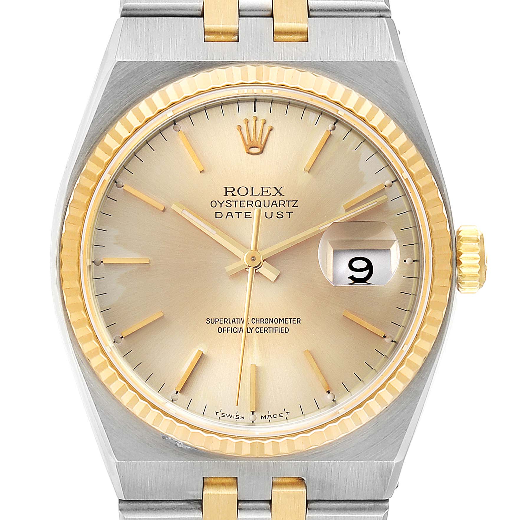 This image shows a close-up of the Rolex Oysterquartz 17013 Men's Steel and Gold (two tone) Champagne Dial 17013 Men's Steel and Gold (two tone) Champagne Dial Datejust watch, featuring the dial, hands, and part of the bezel and bracelet.