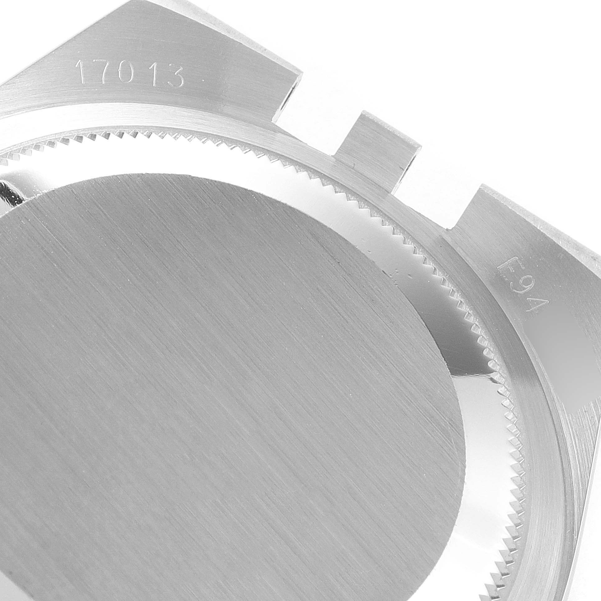 The image shows a close-up of the case back and inner part of the bezel of the Rolex Oysterquartz 17013 Men's Steel and Gold (two tone) Champagne Dial 17013 Men's Steel and Gold (two tone) Champagne Dial model.