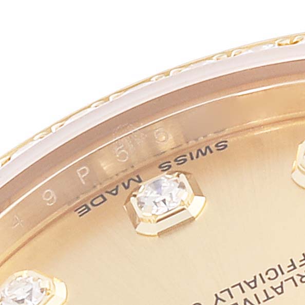 The image shows a close-up of the dial and bezel of a Rolex President 178288 Women's Yellow Gold Champagne Dial 178288 Women's Yellow Gold Champagne Dial model watch, highlighting its diamond hour markers.