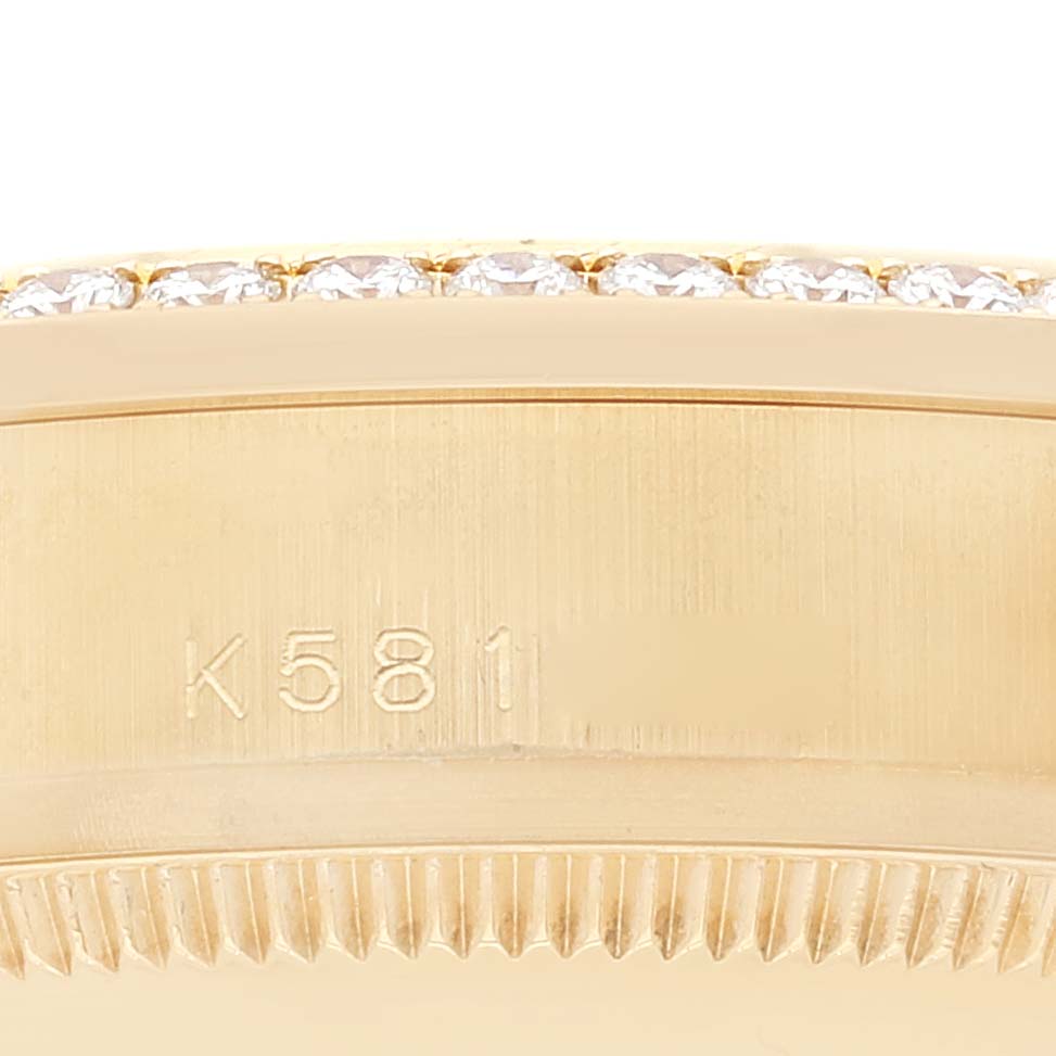 The image shows a close-up angle of the bezel and part of the case of a Rolex President 178288 Women
s Yellow Gold Champagne Dial 178288 Women
s Yellow Gold Champagne Dial model watch.