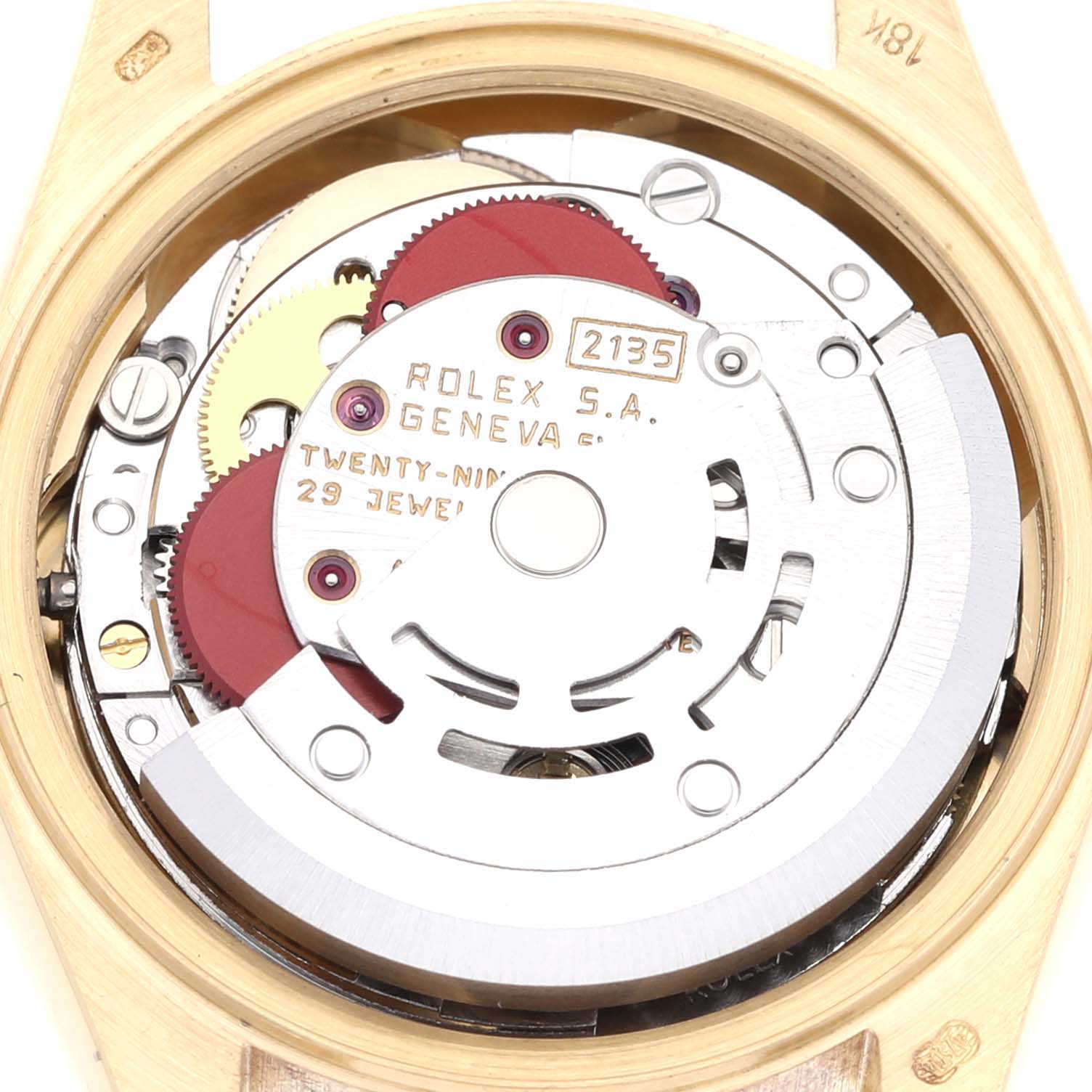 The image shows a close-up of the movement mechanism of the Rolex President 69178G Women's Yellow Gold Champagne Dial 69178G Women's Yellow Gold Champagne Dial model watch, highlighting the internal components and jewels.