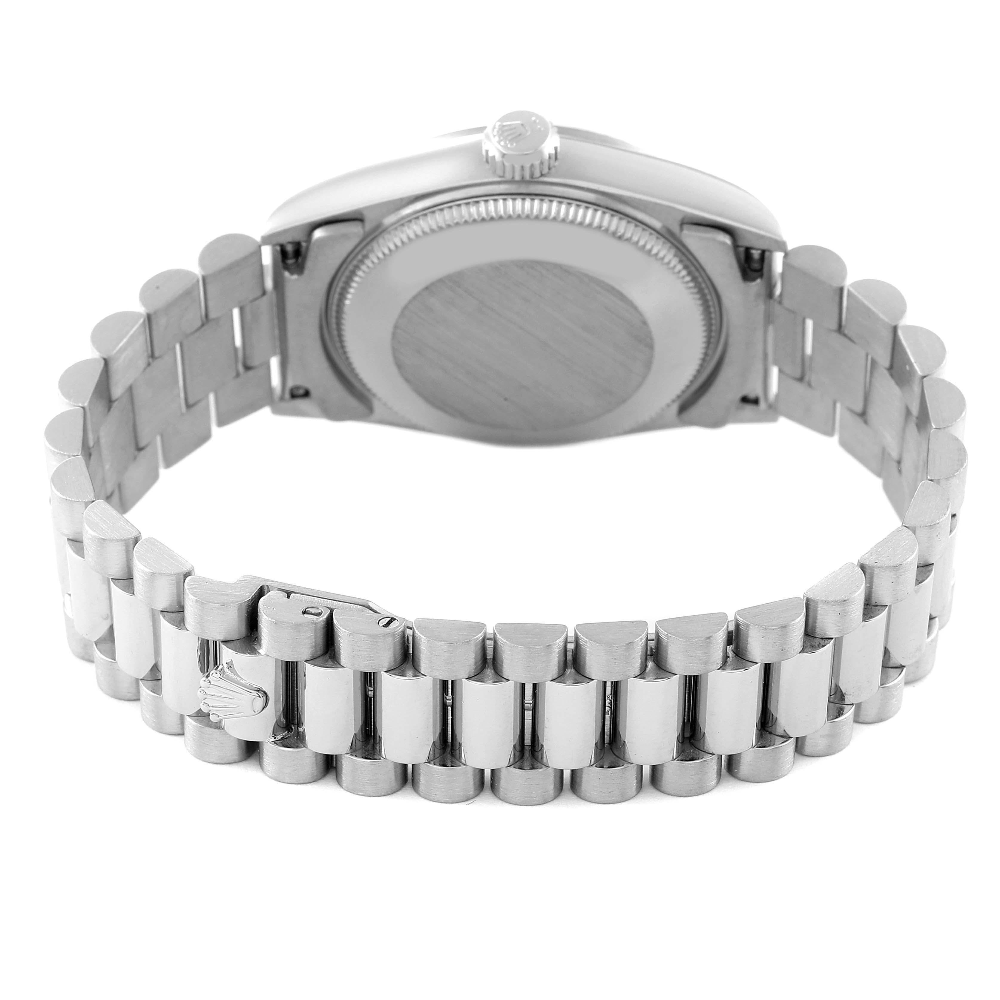 This is a rear view of the Rolex President 68279 Women's White Gold Black Dial 68279 Women's White Gold Black Dial model watch, showing the bracelet, case back, and clasp.