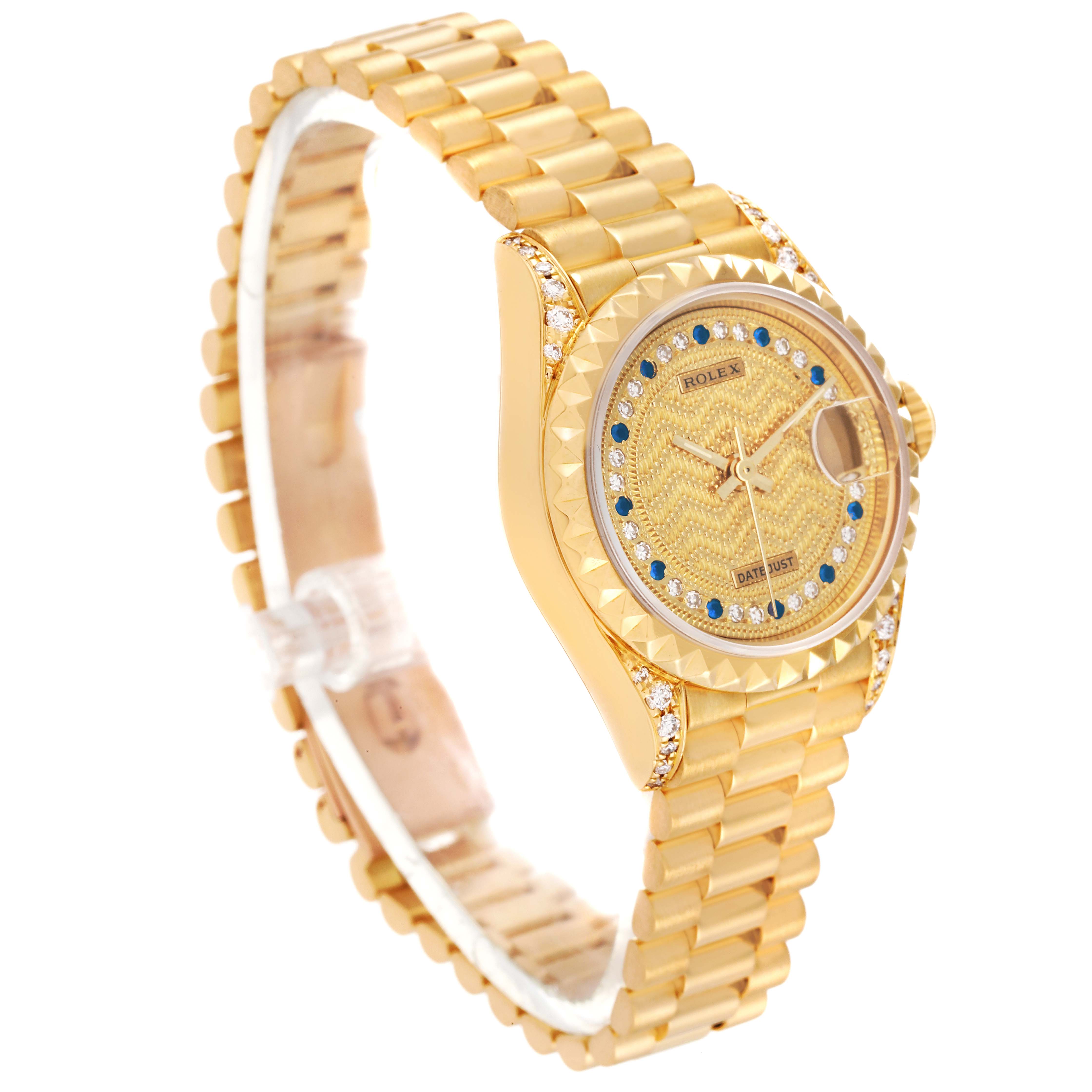 The image shows a Rolex President 69188 Women
s Yellow Gold Champagne Dial 69188 Women
s Yellow Gold Champagne Dial model watch at a three-quarter angle, highlighting its gold bracelet and jeweled bezel and dial.