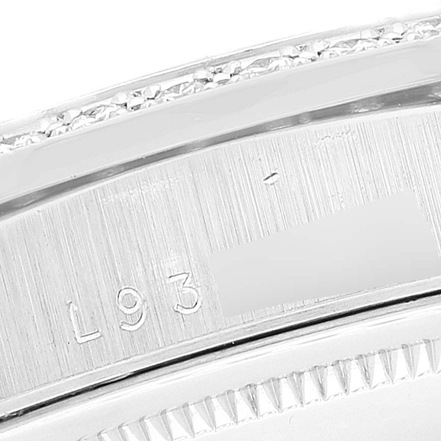 The image shows a close-up of the engraved serial number on the inner bezel of a Rolex President 18346 Men's Platinum Silver Dial 18346 Men's Platinum Silver Dial model watch.