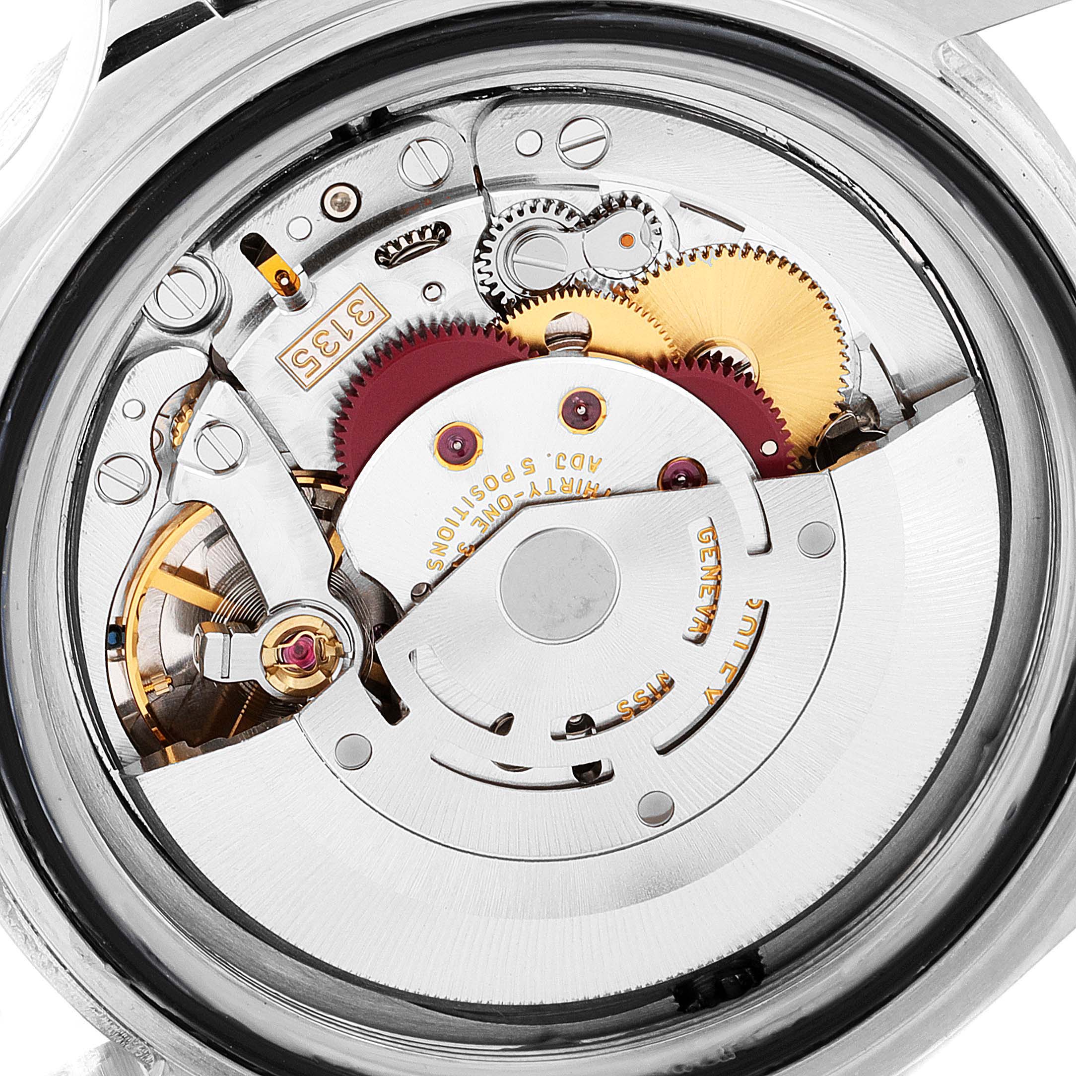 The image shows a close-up of the movement components inside a Rolex Sea-Dweller 16600 Men's Stainless Steel Black Dial 16600 Men's Stainless Steel Black Dial watch.