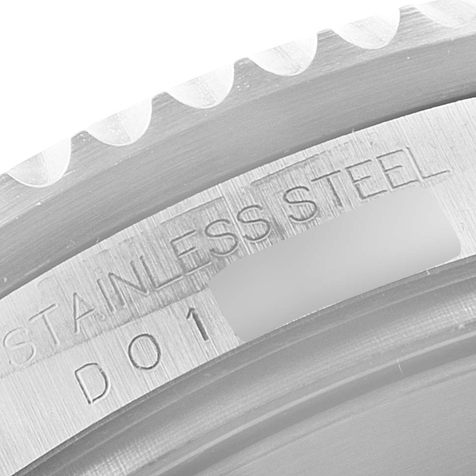 This image shows a close-up of the stainless steel bezel and case back of a Rolex Sea-Dweller 16600 Men's Stainless Steel Black Dial 16600 Men's Stainless Steel Black Dial watch.