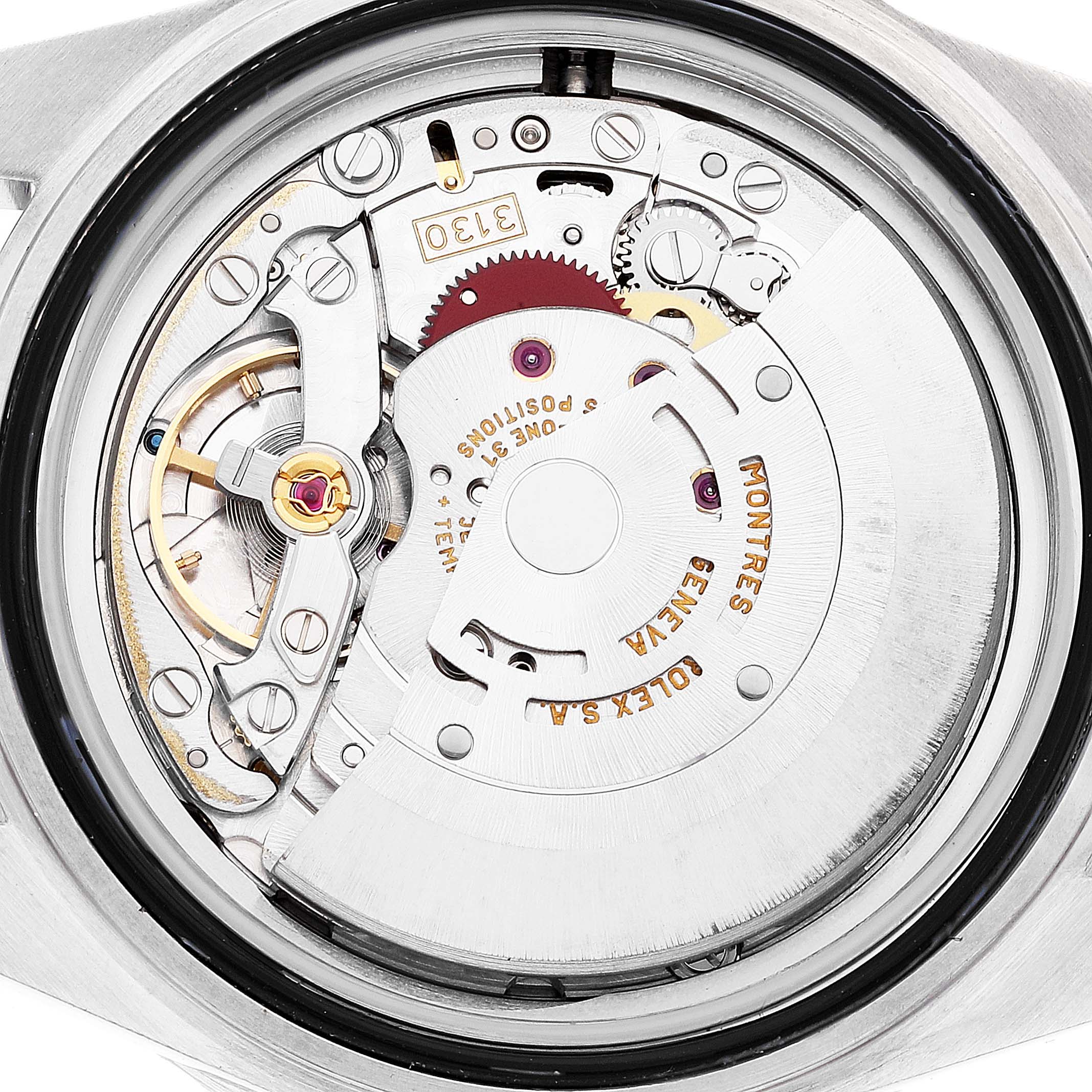 This close-up shows the intricate internal movement of the Rolex Submariner 14060M Men
s Stainless Steel Black Dial 14060M Men
s Stainless Steel Black Dial watch, highlighting its gears and mechanisms.