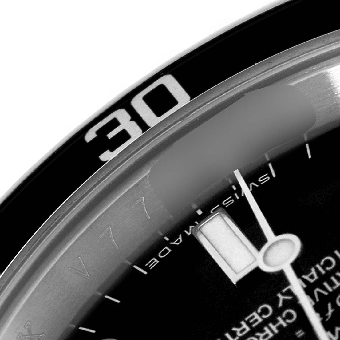 The image shows a close-up of the dial and bezel of the Rolex Submariner 14060M Men
s Stainless Steel Black Dial 14060M Men
s Stainless Steel Black Dial watch at an angle that highlights the 
30
 marker.