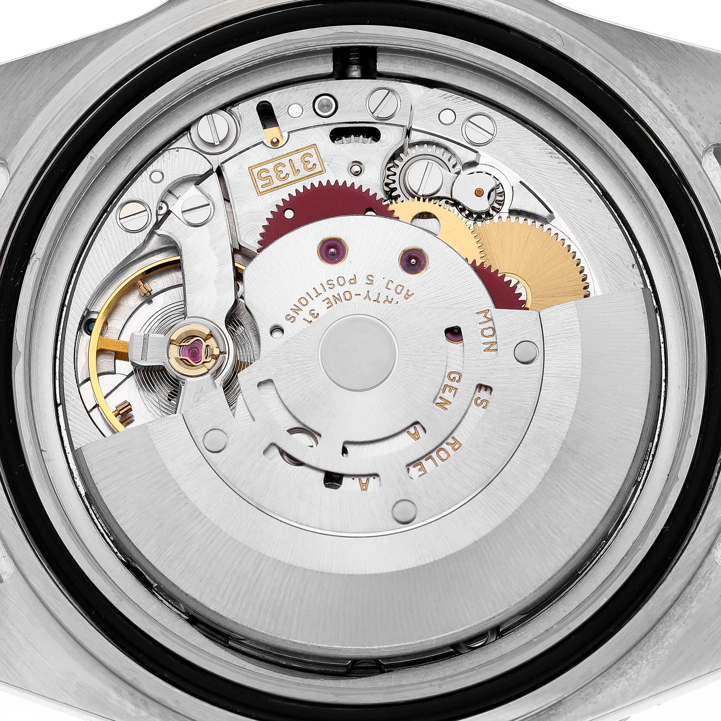 This is a close-up view of the movement and internal mechanism of a Rolex Submariner 16613 Men's Steel and Gold (two tone) Blue Dial 16613 Men's Steel and Gold (two tone) Blue Dial watch.