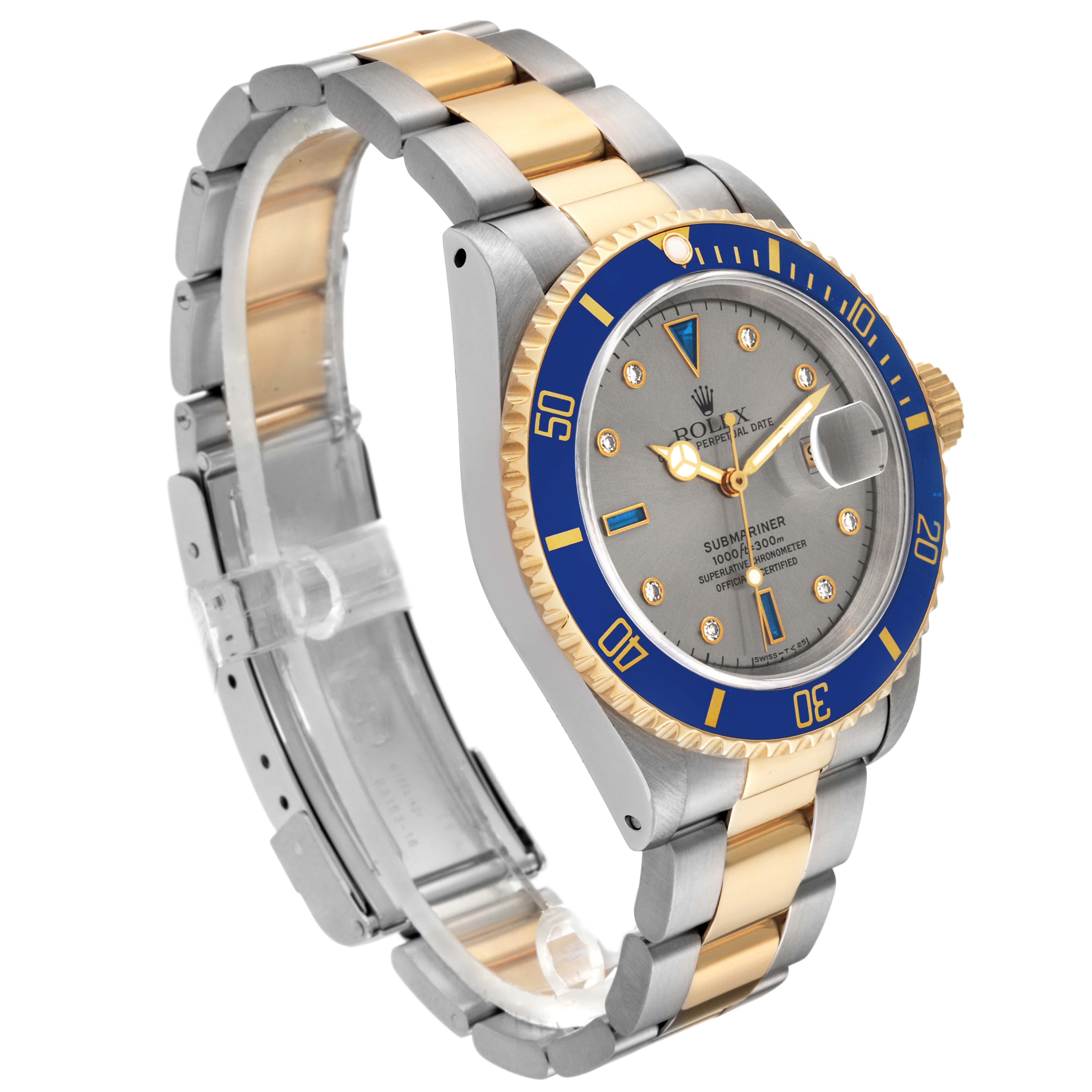 The Rolex Submariner 16613 Men's Steel and Gold (two tone) Grey Dial 16613 Men's Steel and Gold (two tone) Grey Dial watch is shown from an angled side view, displaying the bezel, dial, and bracelet.