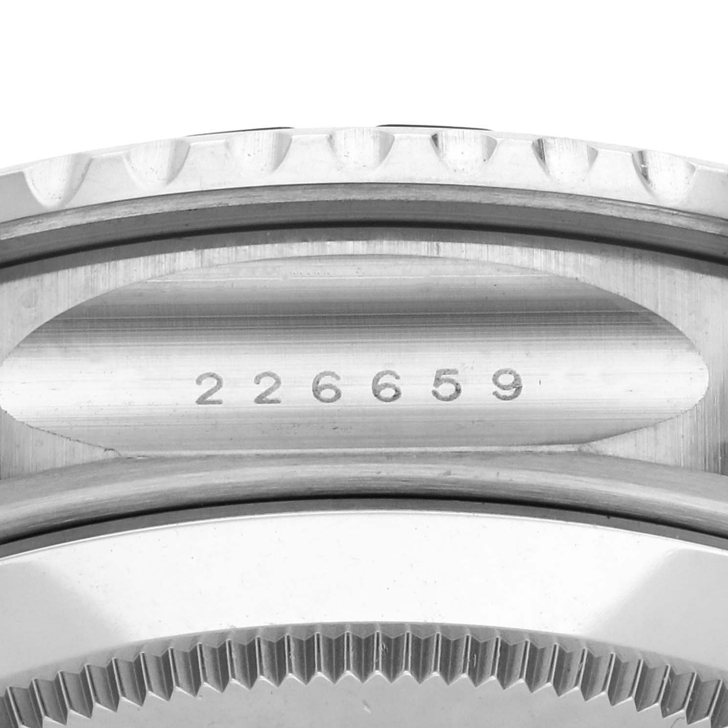 The image shows a close-up of the side engraving and bezel edge of a Rolex Yacht-Master 226659 Men's White Gold Black Dial 226659 Men's White Gold Black Dial watch.