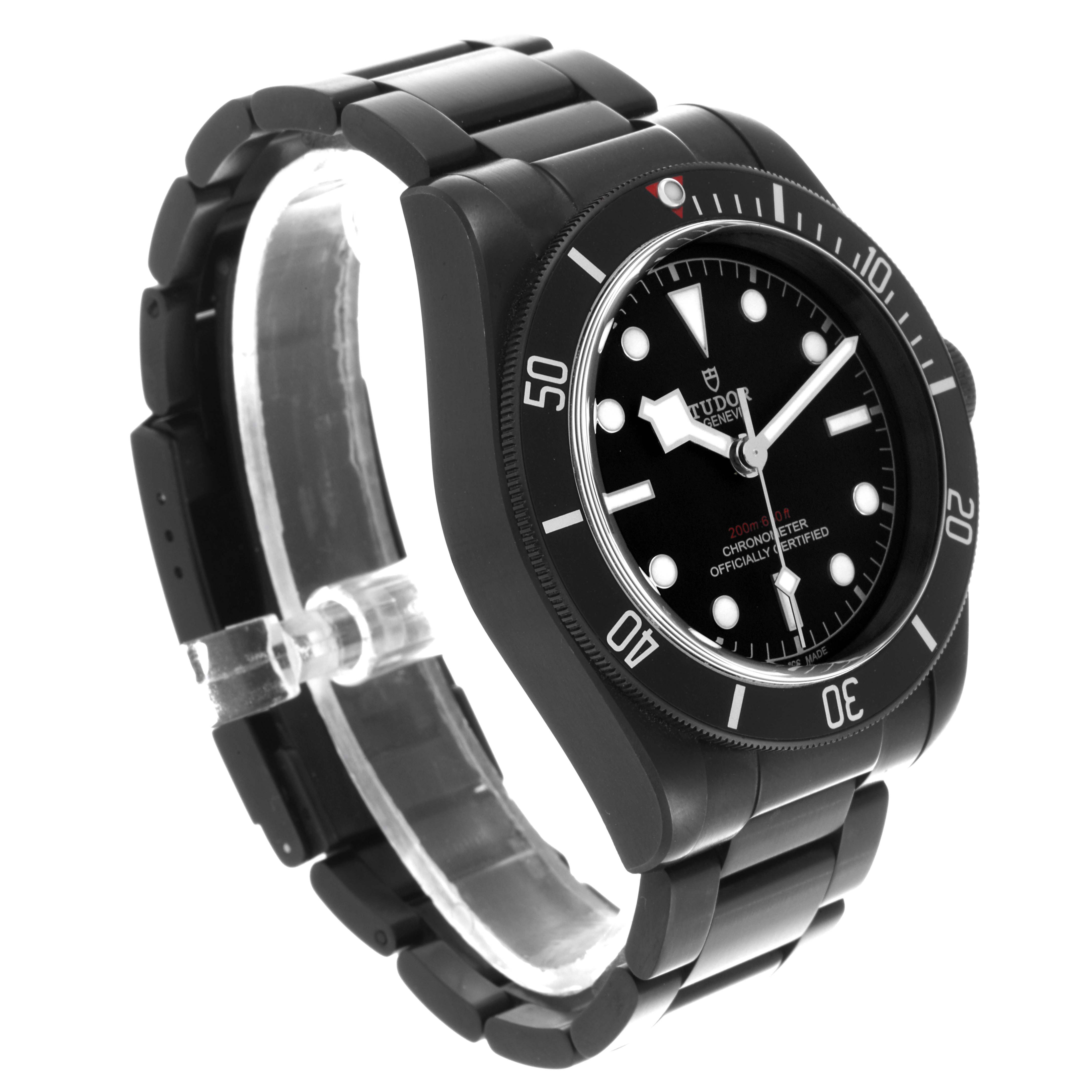 The image shows the Tudor Heritage Black Bay 79230DK Men
s Stainless Steel Black Dial 79230DK Men
s Stainless Steel Black Dial watch from a front-left angle, highlighting the dial, bezel, and bracelet.