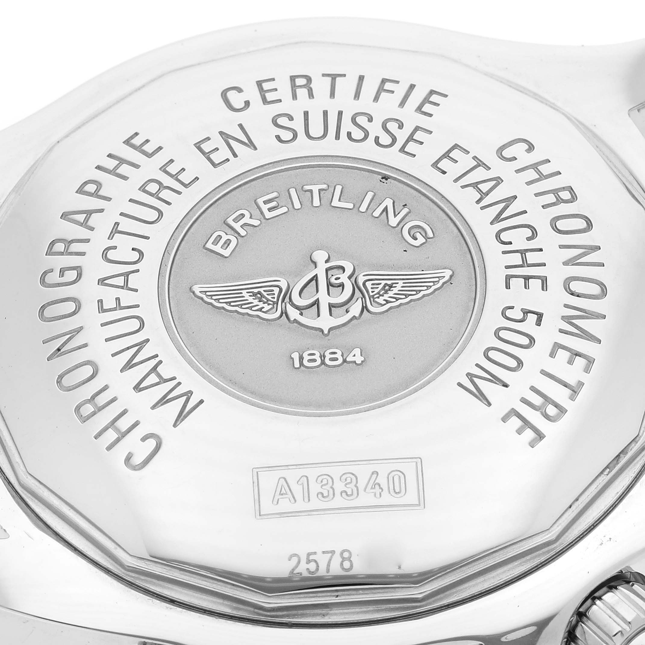 This image shows the back case of a Breitling Superocean A13340 Men's Stainless Steel Black Dial A13340 Men's Stainless Steel Black Dial watch, highlighting the engraved brand details and model number A13340.