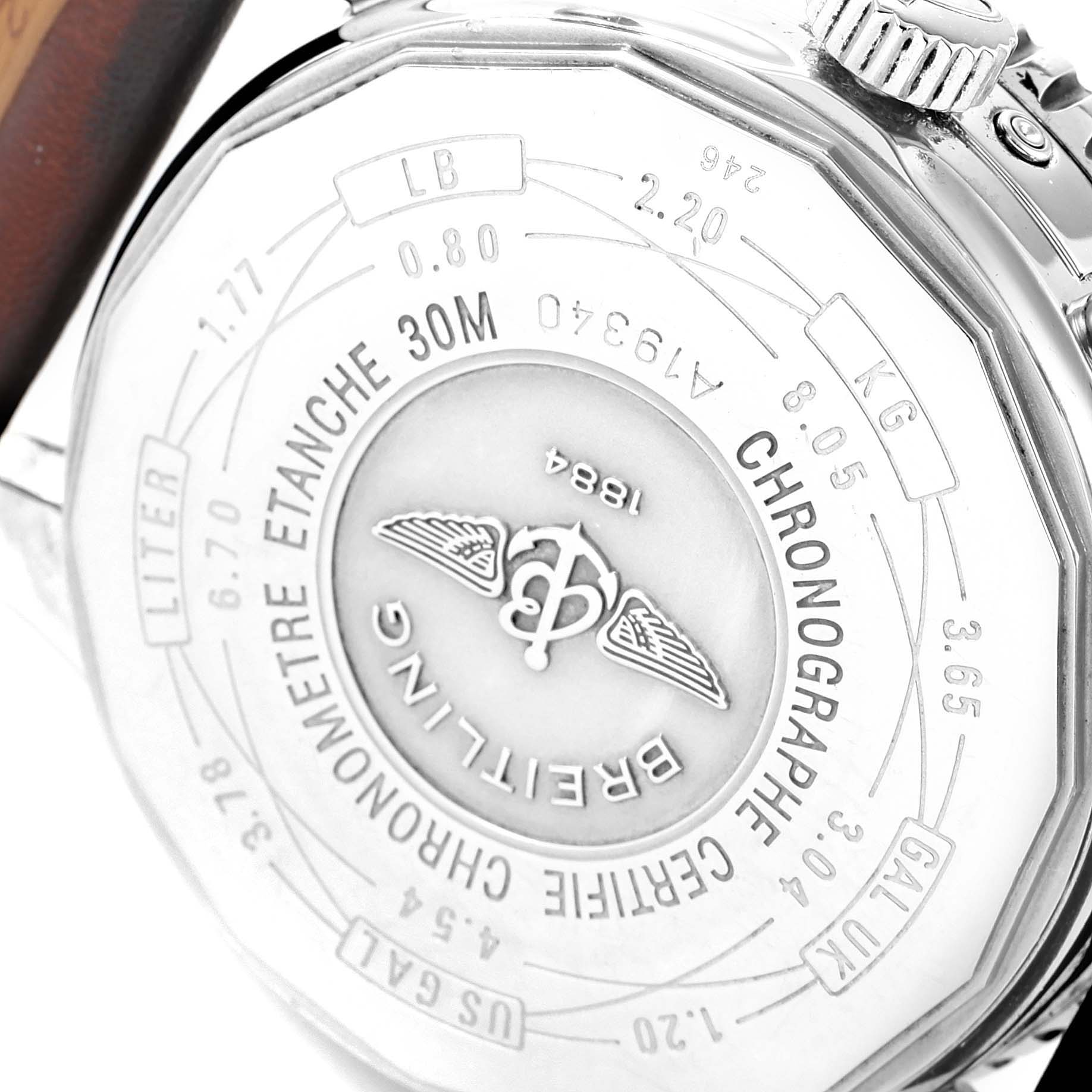 This image shows the back case of a Breitling Navitimer A19340 Men's Stainless Steel Silver Dial A19340 Men's Stainless Steel Silver Dial watch, displaying various engravings and the brand logo.