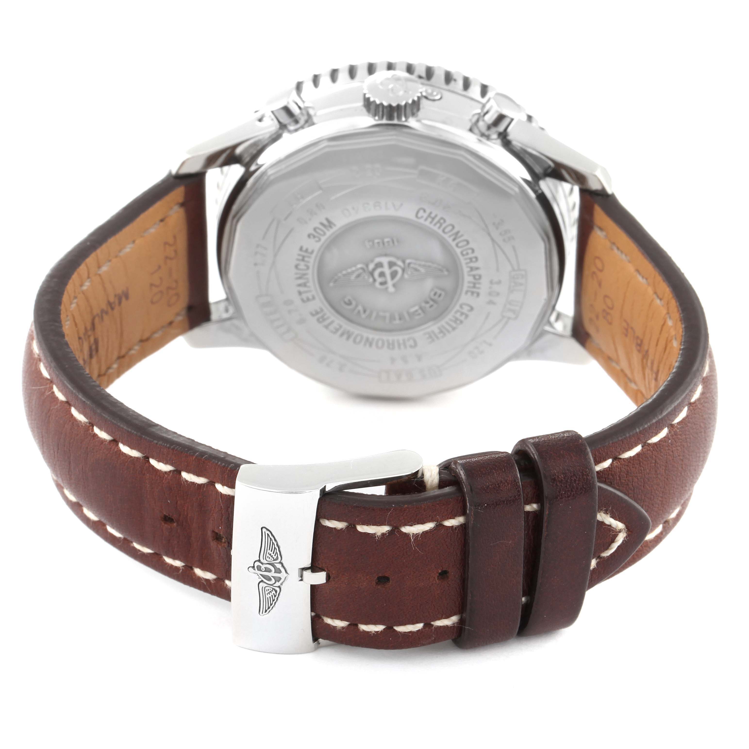 The image shows the back case of a Breitling Navitimer A19340 Men's Stainless Steel Silver Dial A19340 Men's Stainless Steel Silver Dial watch with its leather strap and buckle.