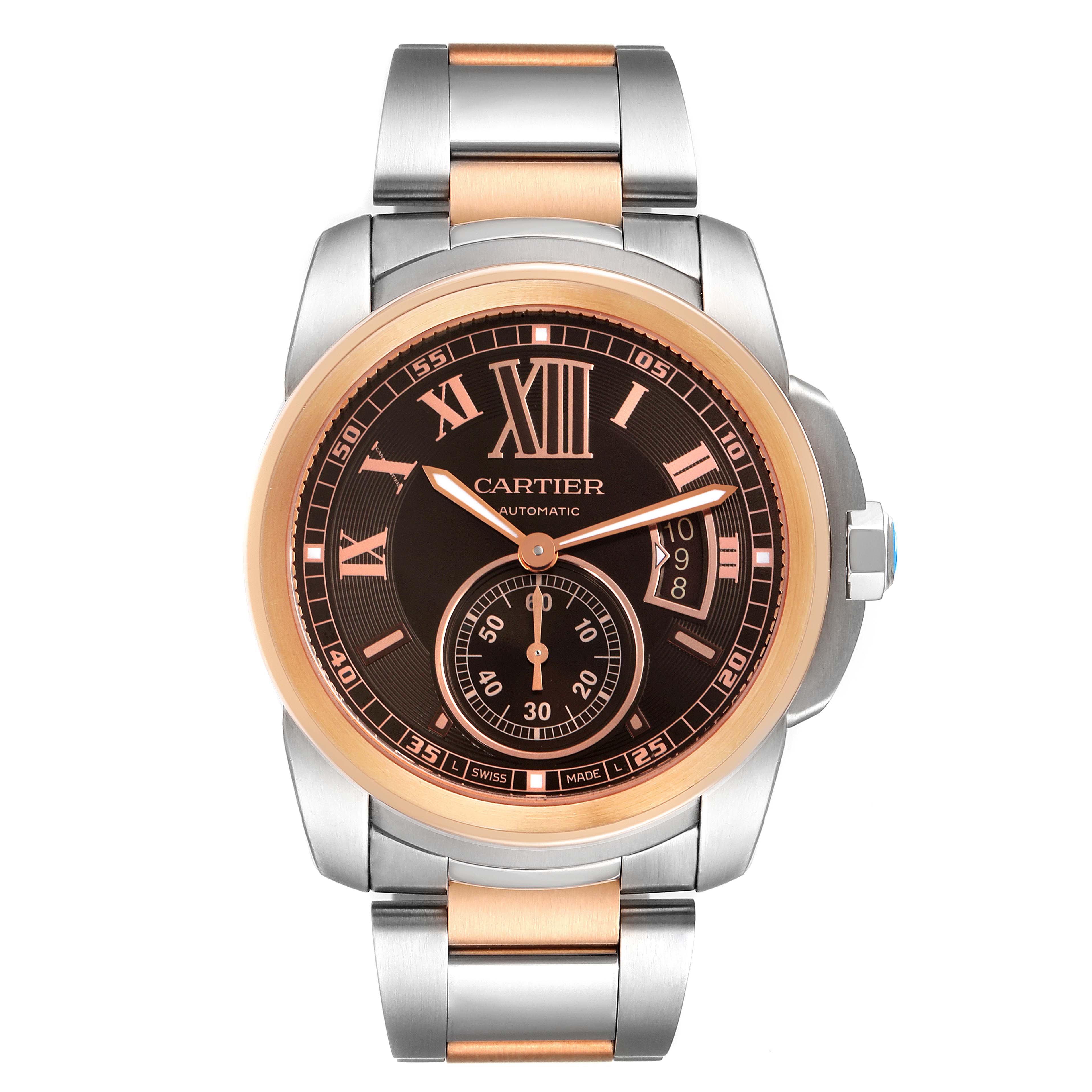 The image shows a front view of the Calibre de Cartier watch by Cartier, featuring a two-tone bracelet and an automatic dial with Roman numerals.