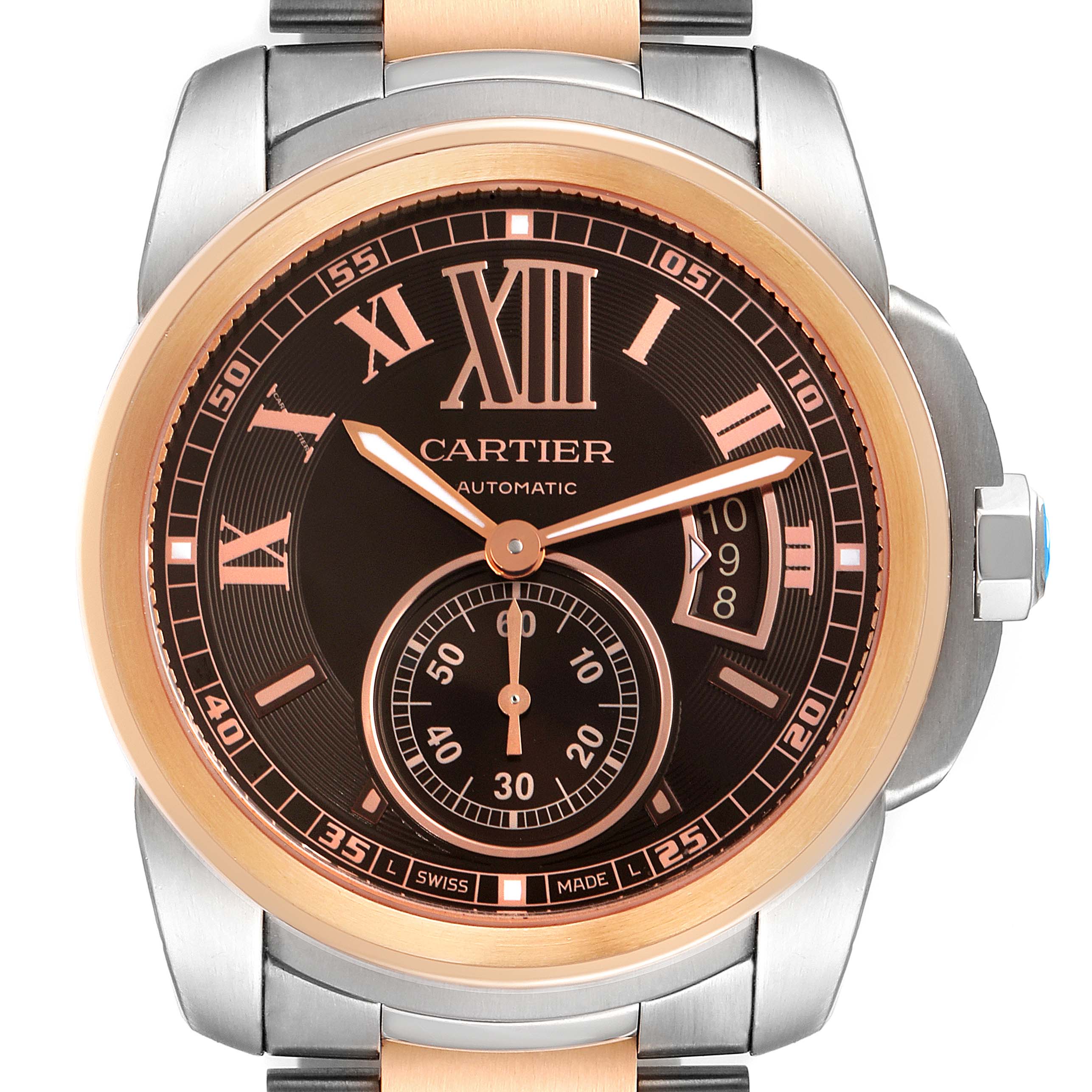 The image shows a front view of the Calibre de Cartier model by Cartier, displaying the watch face, hands, subdial, crown, and part of the bracelet.