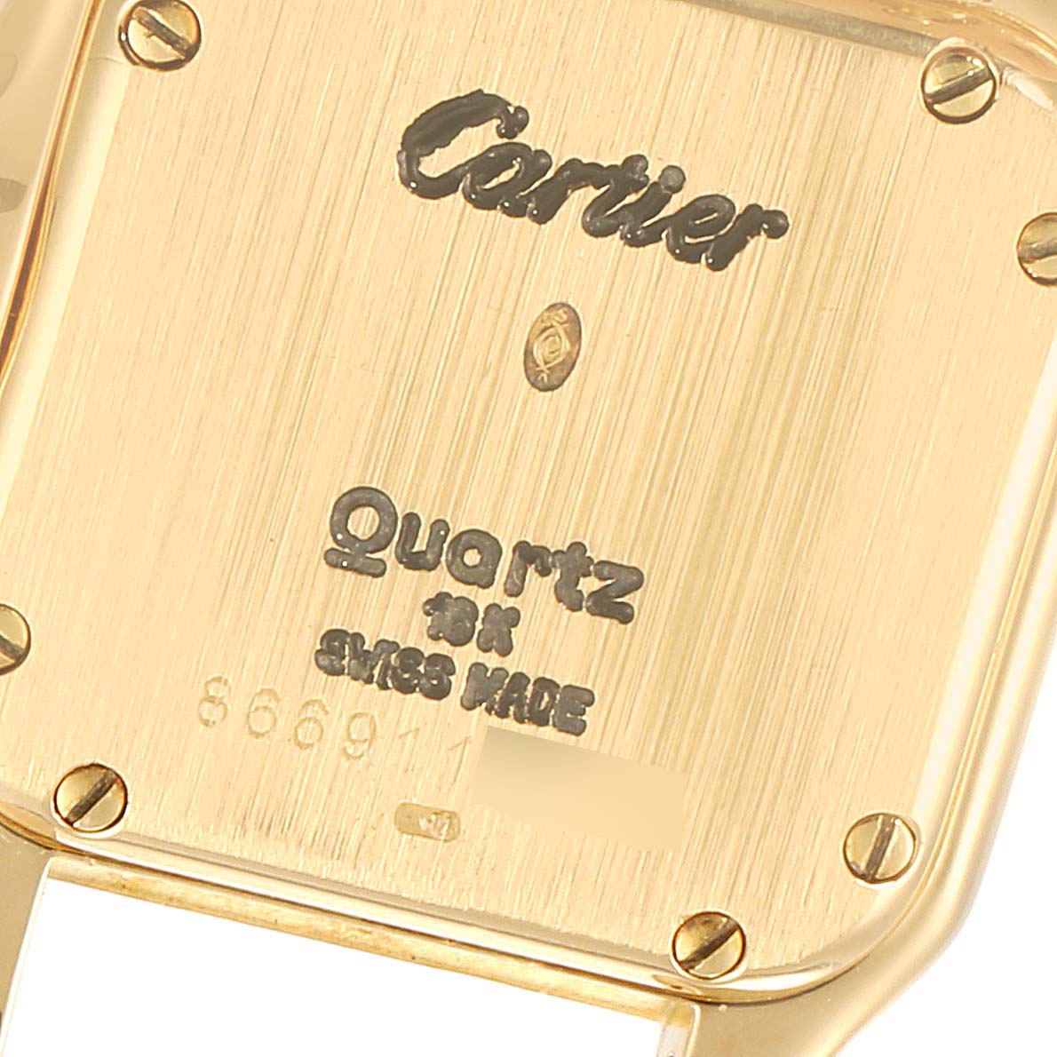 This image shows the back casing of a Cartier Panthere W25022B9 Women
s Yellow Gold Silver Dial W25022B9 Women
s Yellow Gold Silver Dial watch, with visible screws, engravings, and the "Quartz" marking.
