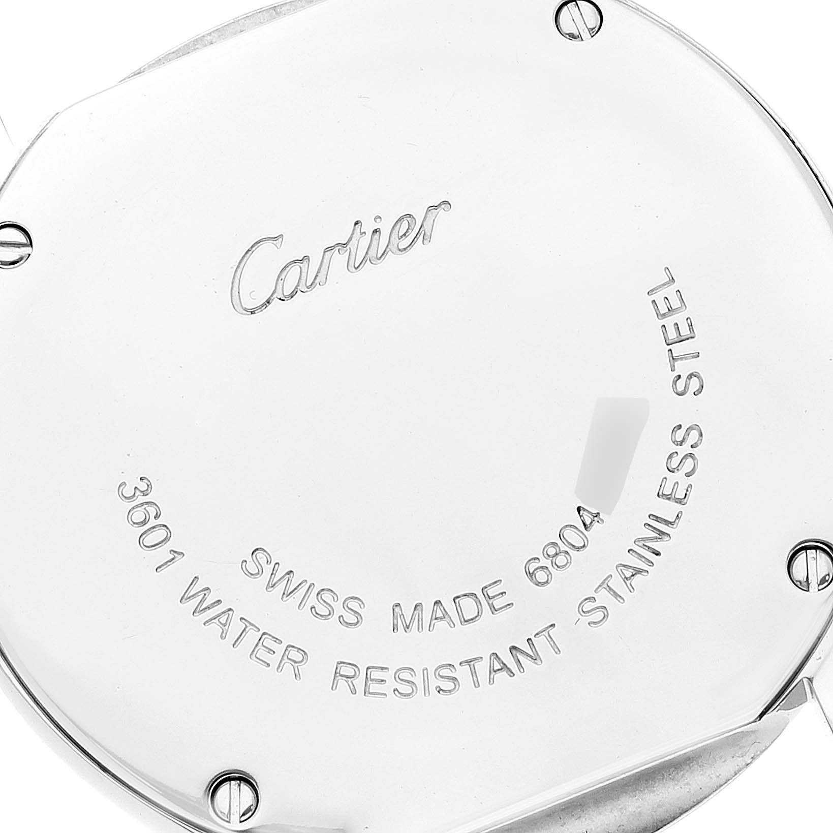 This image shows the back case of the Ronde watch by Cartier, highlighting inscriptions and screws.