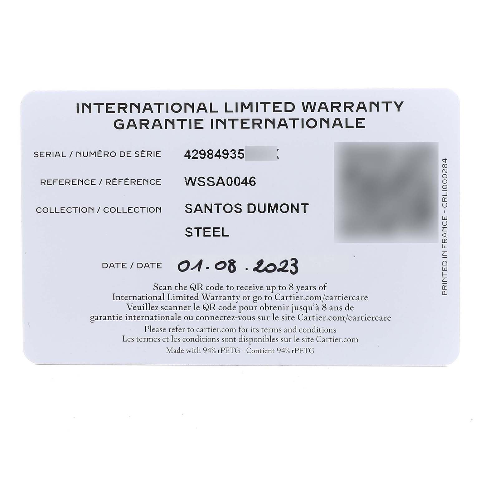 The image shows an International Limited Warranty card for a Cartier Santos Dumont WSSA0046 Men's Stainless Steel Black Dial WSSA0046 Men's Stainless Steel Black Dial watch.