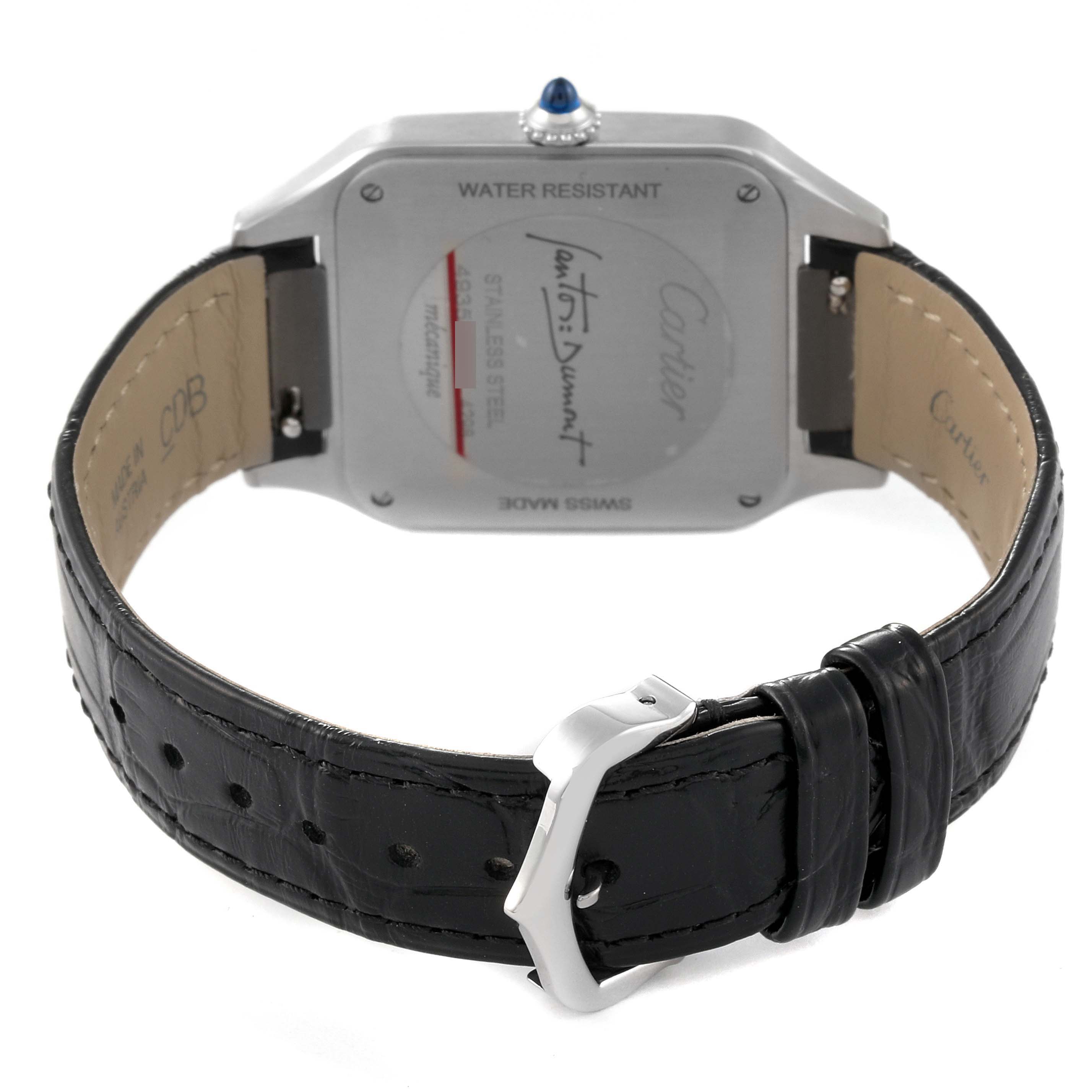The image shows the back of a Cartier Santos Dumont WSSA0046 Men's Stainless Steel Black Dial WSSA0046 Men's Stainless Steel Black Dial watch, highlighting its case back, leather strap, and buckle.