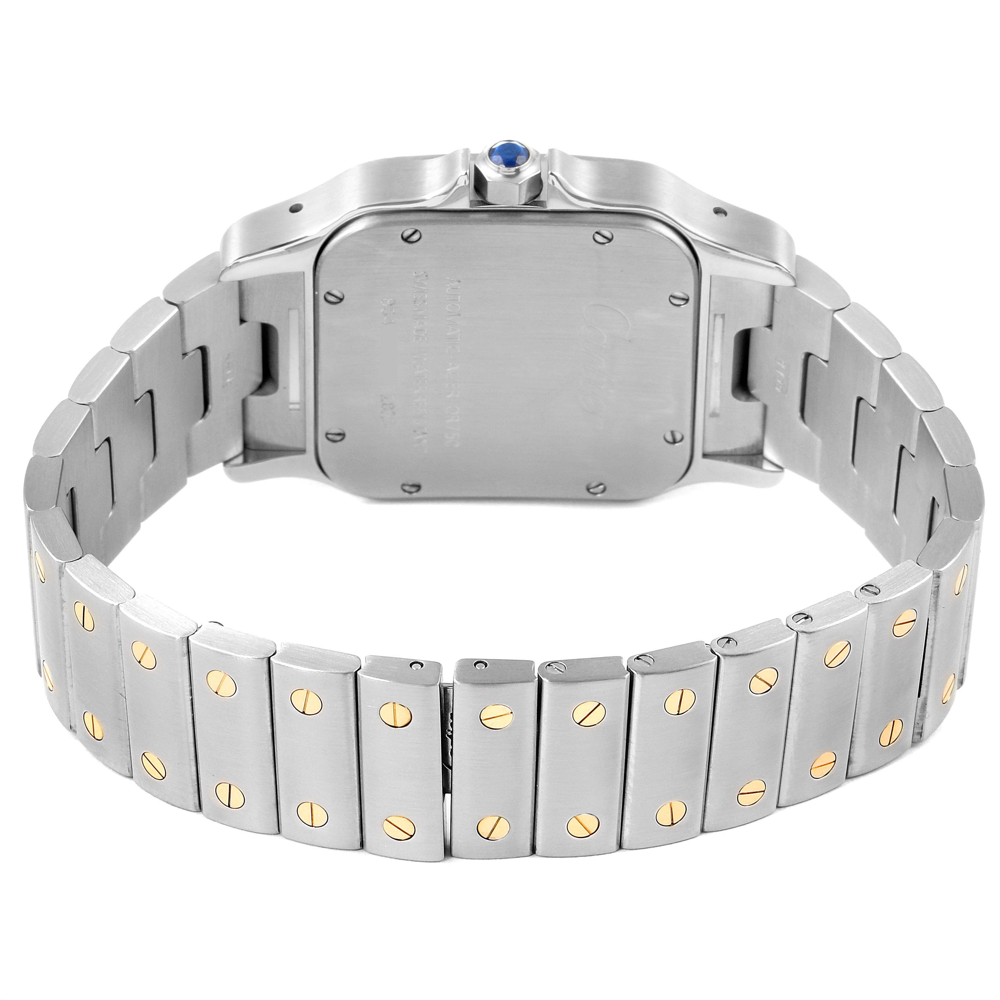 The image shows the back case and bracelet of the Cartier Santos W20099C4 Men
s Steel and Gold (two tone) Silver Dial W20099C4 Men
s Steel and Gold (two tone) Silver Dial watch, featuring a blue cabochon crown.