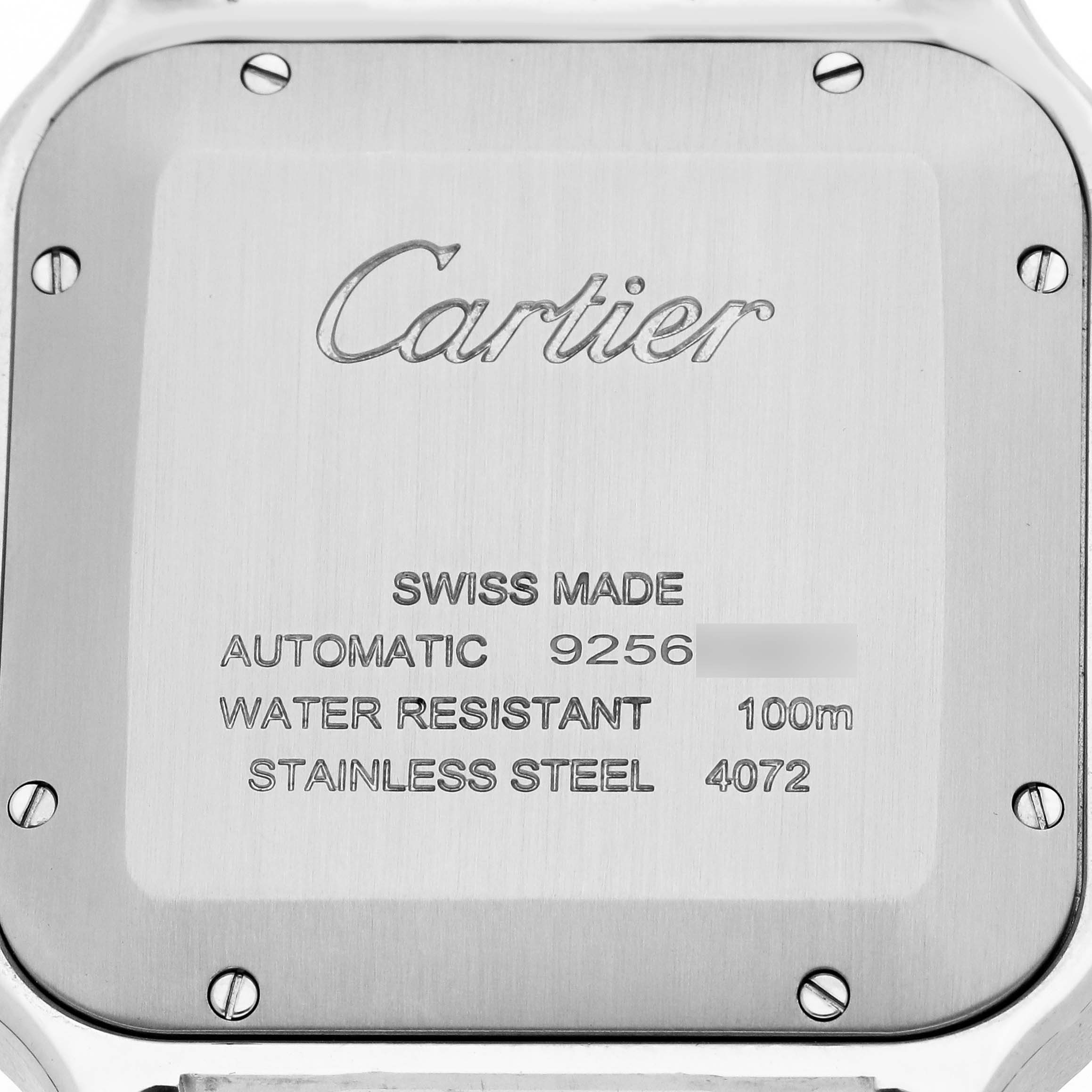 The image shows the back of a Cartier Santos WSSA0037 Men's Stainless Steel Grey Dial watch, highlighting brand engraving and specifications.