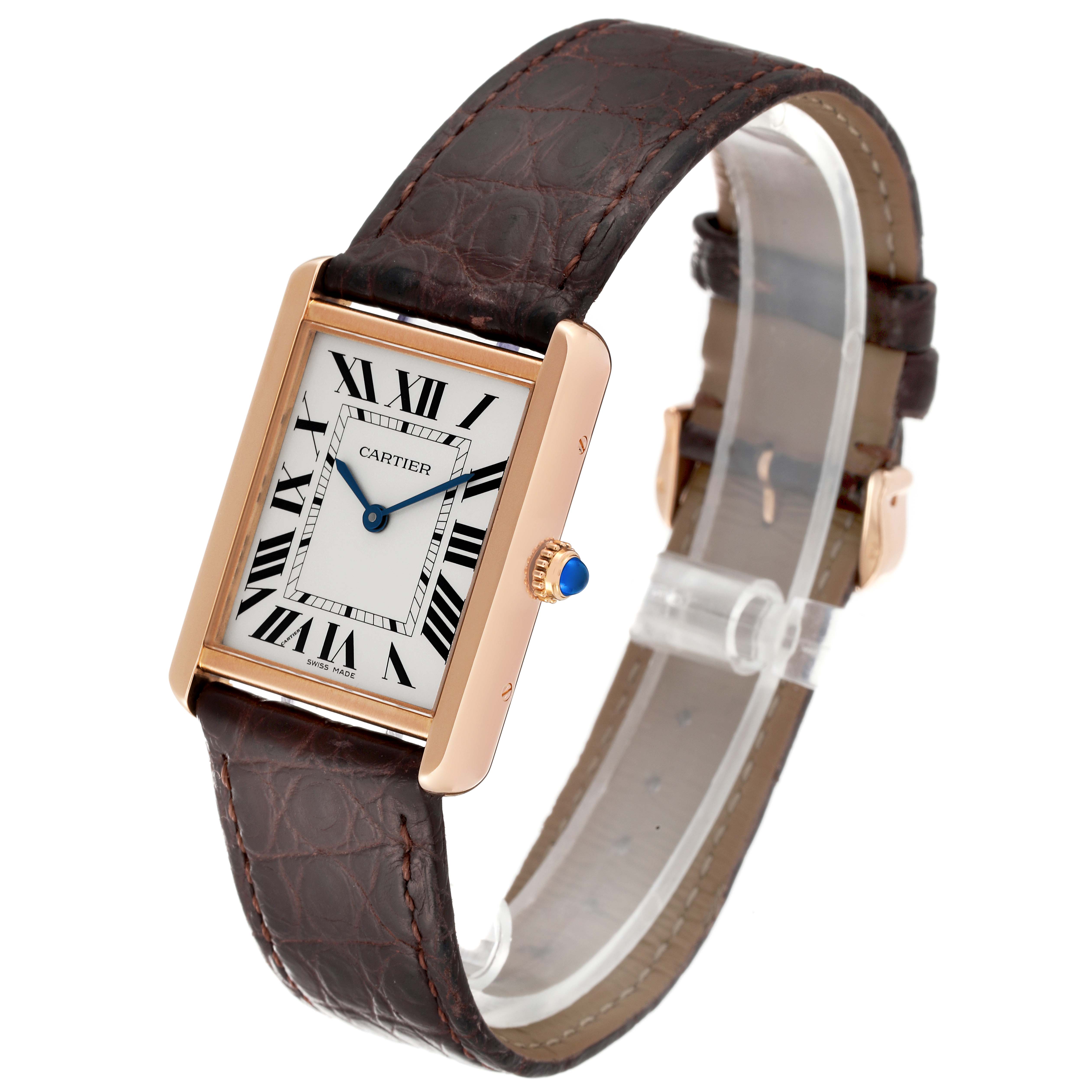 The Cartier Tank Solo W5200025 Men
s Steel and Gold (two tone) Silver Dial W5200025 Men
s Steel and Gold (two tone) Silver Dial watch is shown from a three-quarter angle, highlighting its rectangular face, blue hands, and brown leather strap.